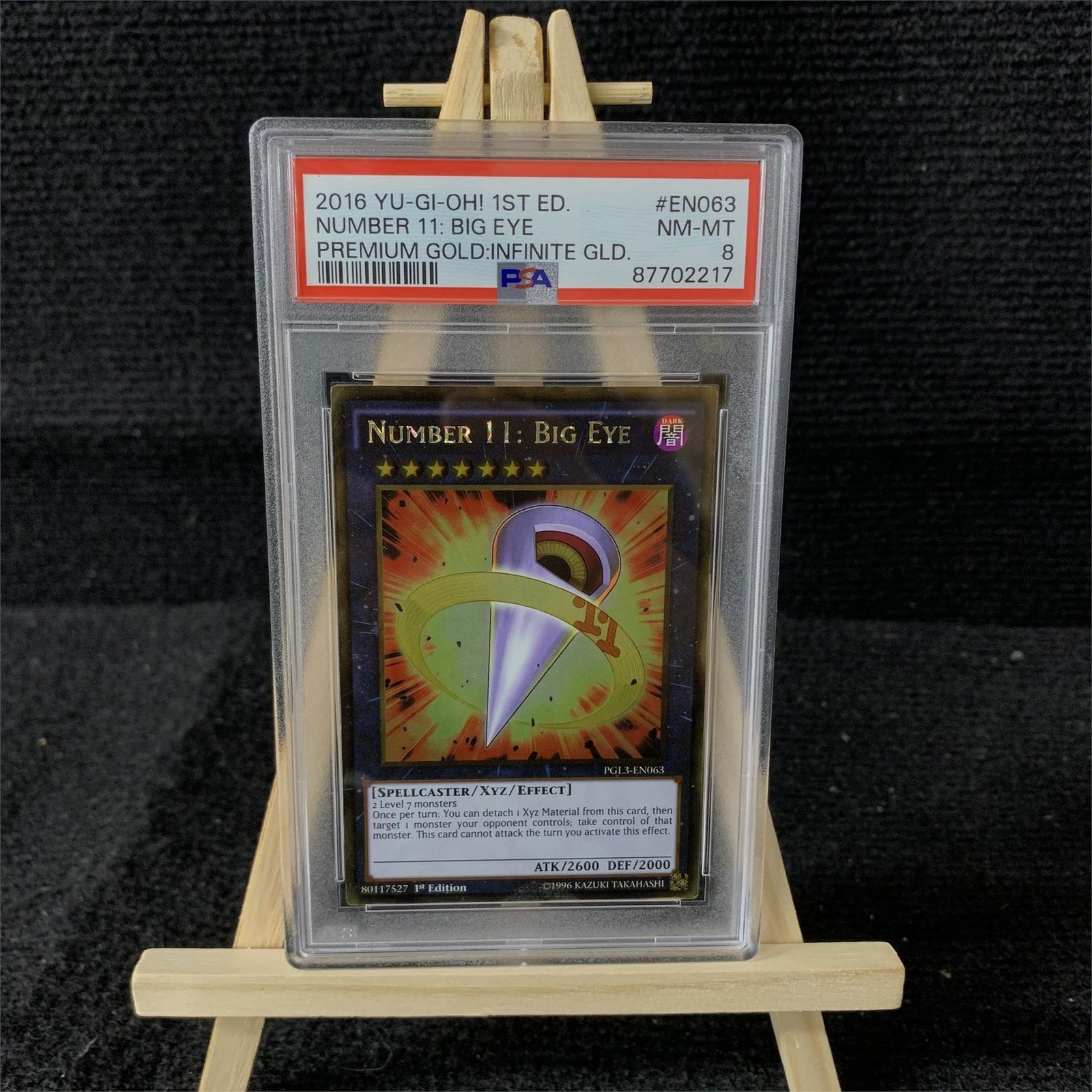 PSA 8 Number 11: Big Eye Gold 1st Ed (1 of 2)