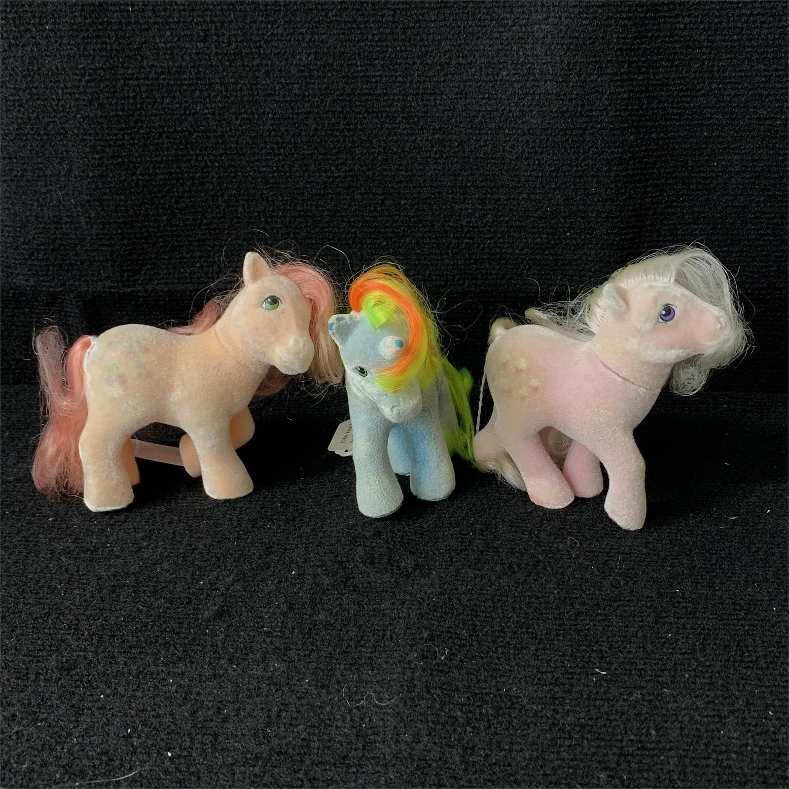 My Little Pony G1 So Soft Cherries Jubiliee Ribbon Lickety Split: G1 MLP Year 4 (85-86) So Soft Ponies including Cherries Jubilee, Lickety Split and Ribbon. None appear to have had a tail or mane haircut. The flocking on Cherries Jubilee and Lickety Split seems inta