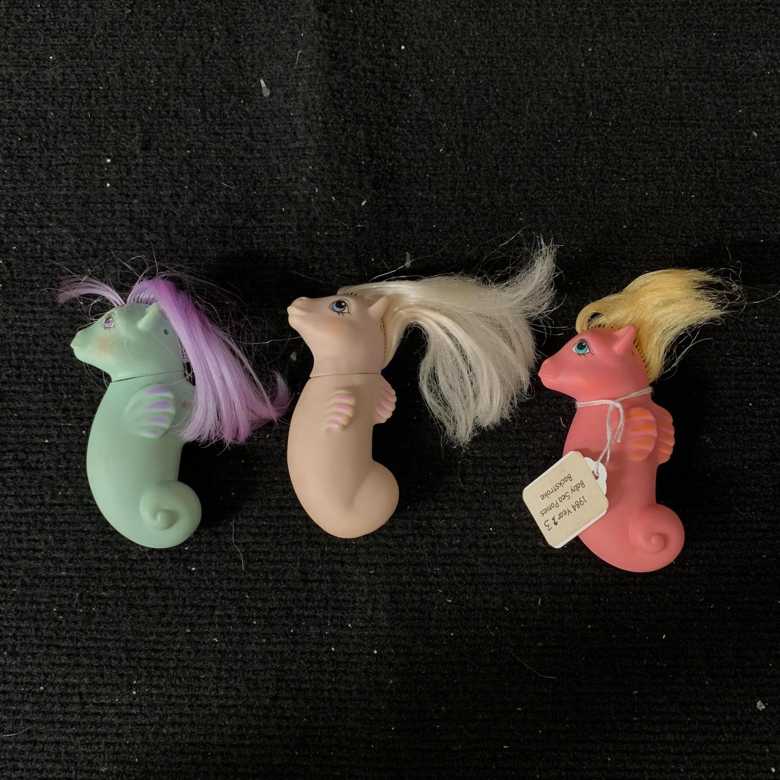 Lot of 3 G1 MLP Sea Ponies: This lot contains three G1 MLP Year 3 (84-85) Baby Sea Ponies including Backstroke, Splasher and Surf Rider. Backstroke has had a haircut but otherwise all three are in good played with condition. We 
