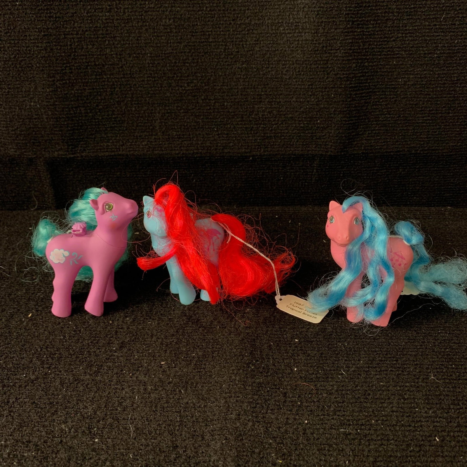 Lot of 3 G1 MLP Flutter Ponies: This lot contains three G1 MLP Year 5 (86-87) Flutter Ponies including Cloud Puff, Tropical Breeze and Wingsong. Wingsong is missing her tabs to clip in wings and has a mark on one leg. Otherwise in g