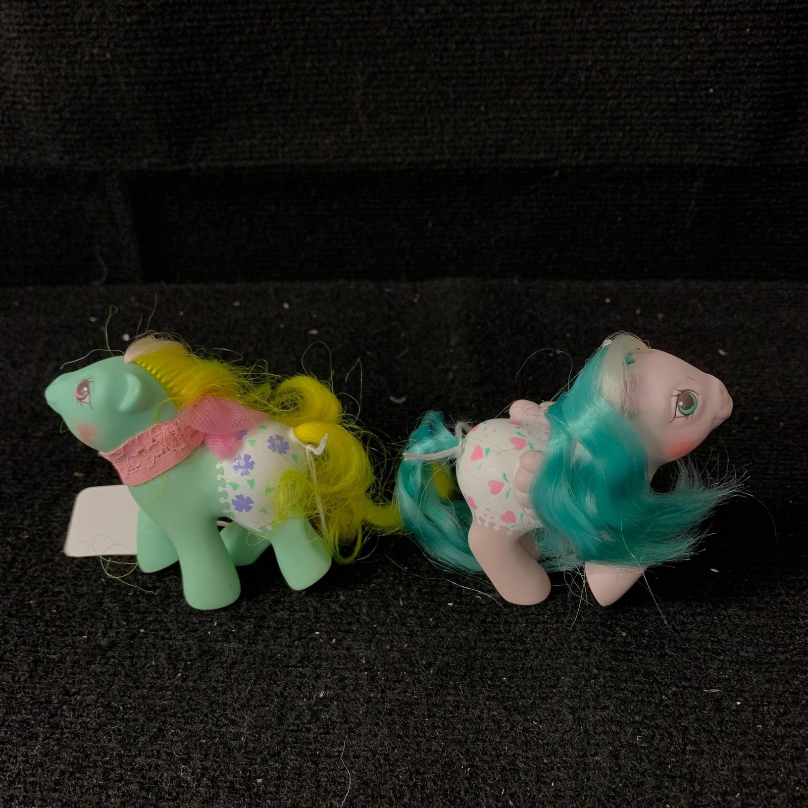 Baby Sunnybunch & Baby Dots 'n Hearts: G1 MLP Year 7 (88-89) Baby Fancy Pants Ponies Baby Dots 'n Hearts and Baby Sunnybunch. Both are in excellent played with condition with no apparent haircuts or markings.