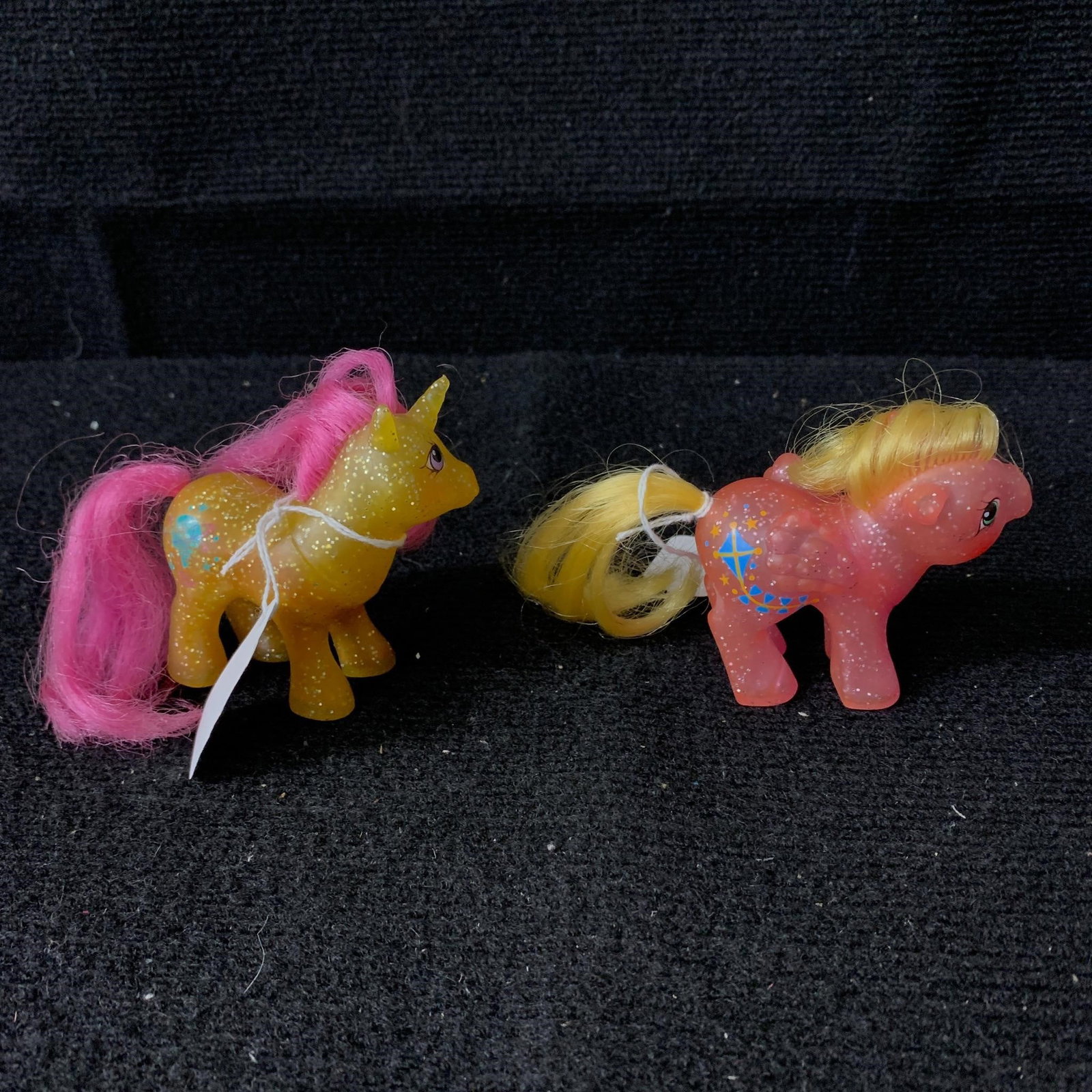 Baby Gusty and Baby Firefly Sparkle Ponies: G1 MLP Year 8 (89-90) Baby Sparkly Ponies Baby Firefly and Baby Gusty. Both appear to be in excellent played with condition with no apparent haircuts or markings.