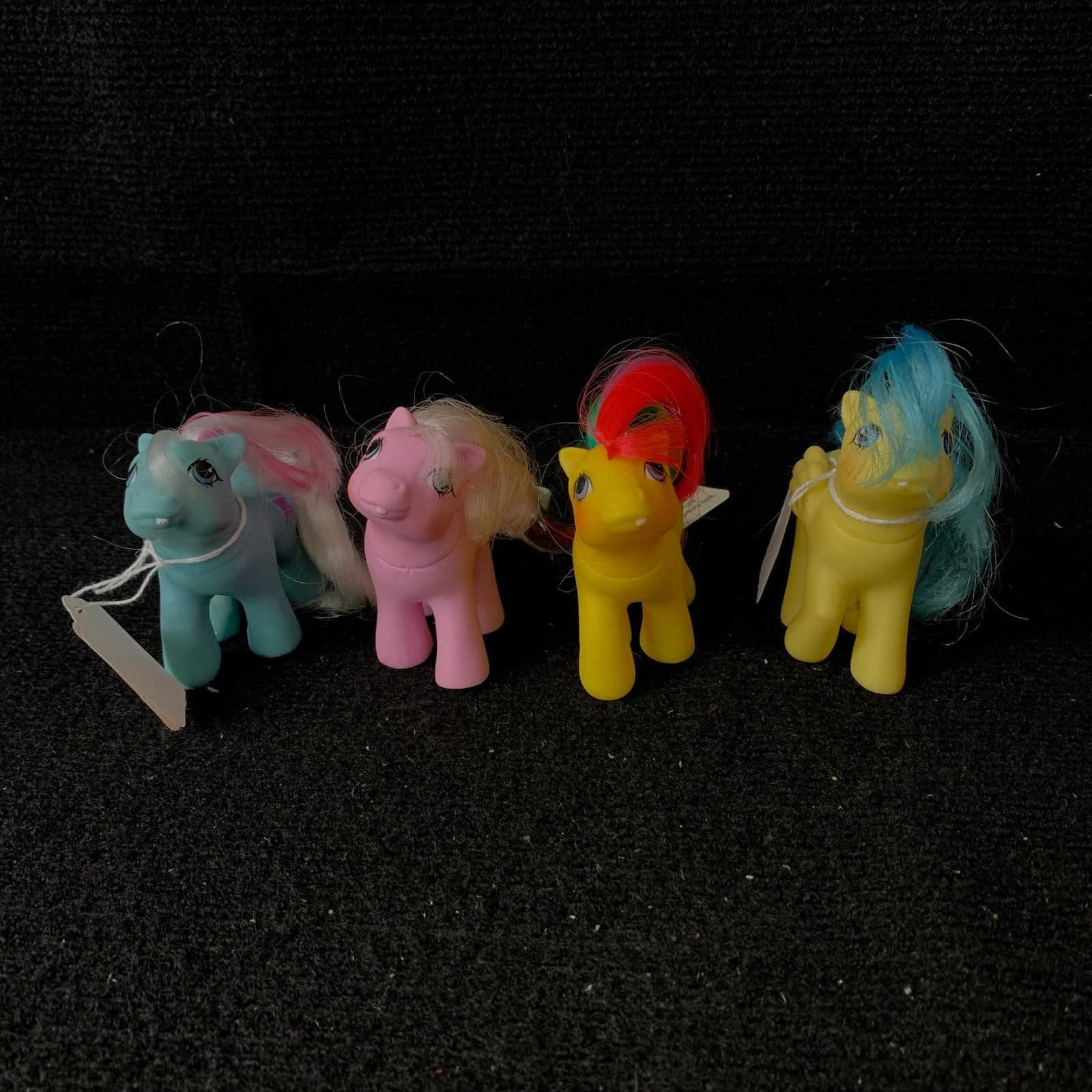 Baby Bouncy, Fifi, Lickety-Split & Tic Tac Toe: G1 MLP Year 5 (86-87) Baby Ponies with First Tooth including Baby Bouncy, Baby Fifi, Baby Lickety-Split and Baby Tic Tac Toe. All are in excellent played with condition but Baby Bouncy has a mark on o