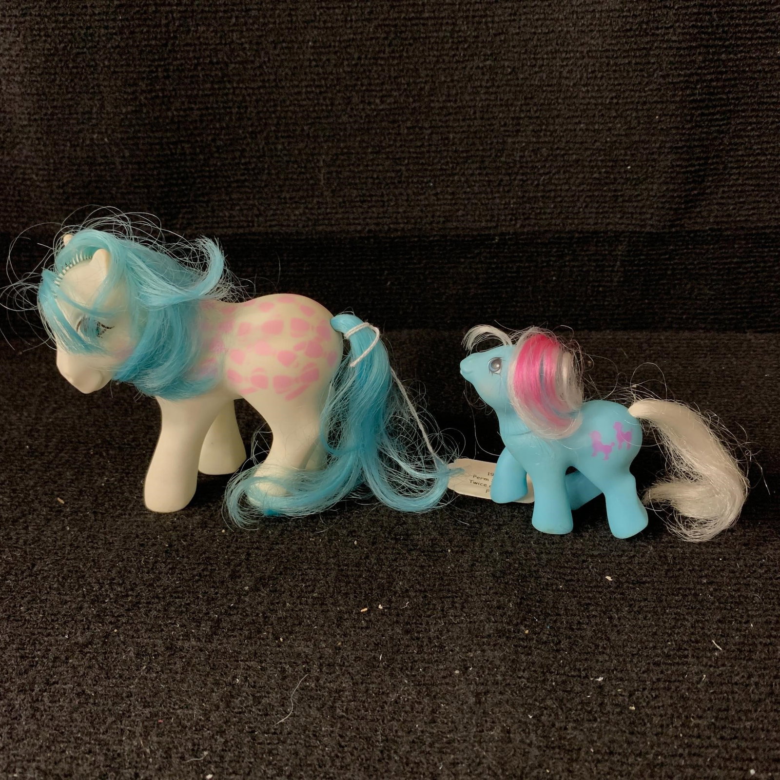Twice as Fancy Fifi & Baby Fifi: G1 MLP Year 5 (85-86) Perm Shoppe Fifi and G1 MLP Year 5 (85-86) First Tooth Baby Fifi. Baby Fifi is in excellent played with condition with no apparent haircuts or marks. Her cutie mark is clear with