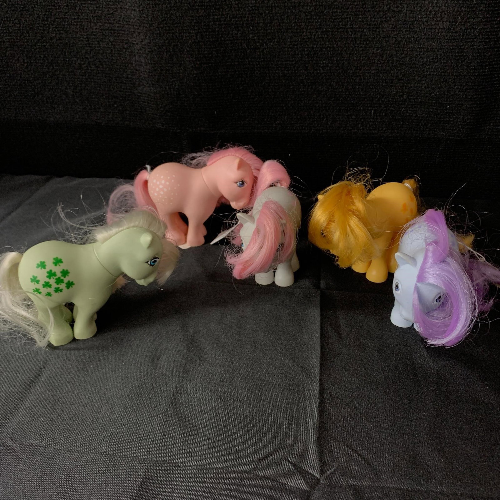 Lot of 5 Flatfoot G1 MLP: This lot includes 5 G1 Year 1 (82-83) Original Ponies including Blue Belle, Butterscotch, Cotton Candy, Minty and Snuzzle. All are in played with condition but none appear to have had their tails or n