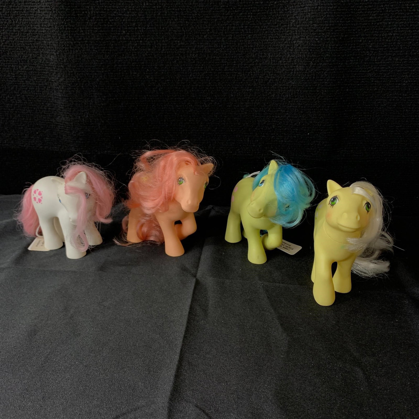 Lot of 4 Year 3 Earth Ponies: This lot includes 4 G1 Year 3 (84-85) Earth Ponies including Cherries Jubilee, Posey, Tootsie and Sundance. They are all in played with condition but do not appear to have any tail or mane haircuts. P
