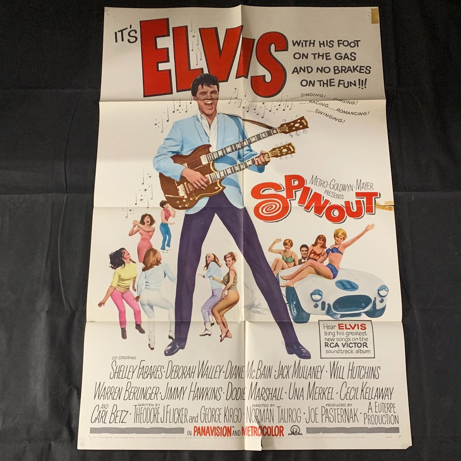 Spinout Original Elvis One-Sheet Movie Poster: Spinout Original 1966 Movie Poster. Staring Elvis. 66/309. measures 27X41 The posters in this auction belonged to a single owner. He owned movie theaters from the 50s-70s and would keep all of the pos