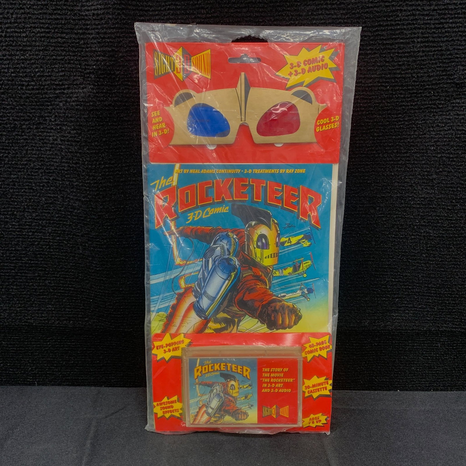 Rocketeer 3-D Comic & Cassette Sealed: We are a veteran owned company. Please look at the pictures carefully to determine what you believe the condition of collectible is. We are currently accepting consignments. Email us a aeronhouse1994@