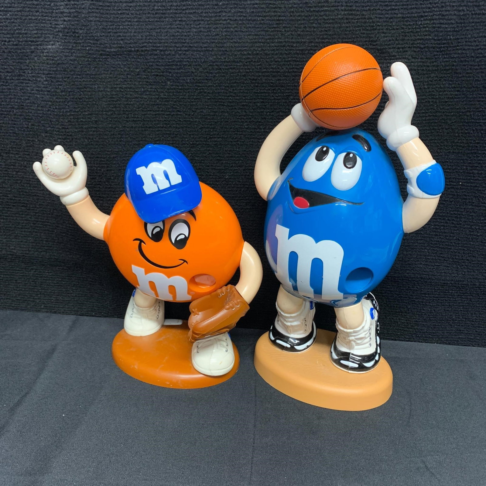 Vintage M&M Sports Candy Dispensers: We are a veteran owned company. Please look at the pictures carefully to determine what you believe the condition of collectible is. We are currently accepting consignments. Email us a aeronhouse1994@