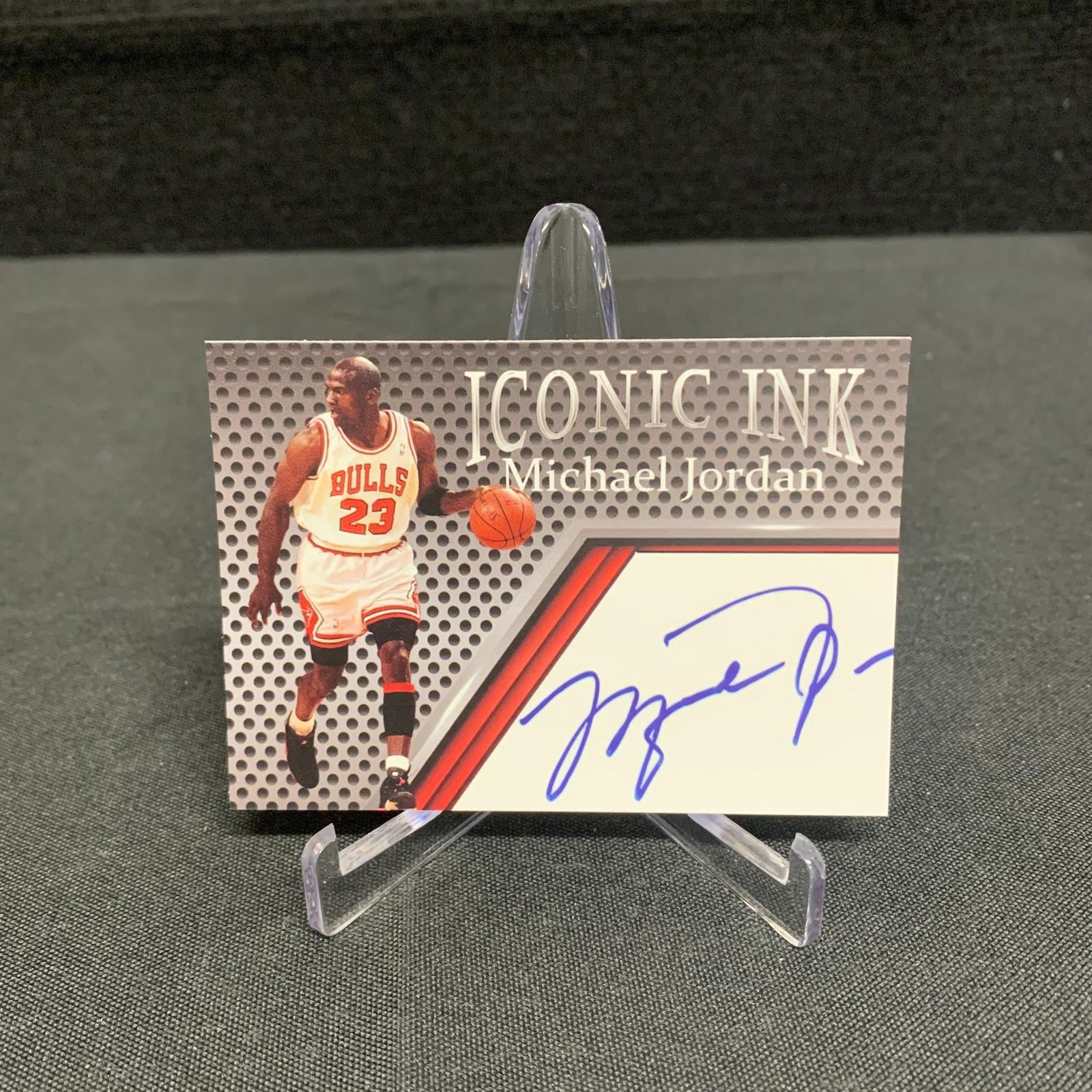 Michael Jordan Iconic Ink Basketball Card: Iconic Ink cards are the name of the manufacturer of the product and they specialize in sport card sets with facsimile autographs as part of their trading card front. The backs of some of these cards