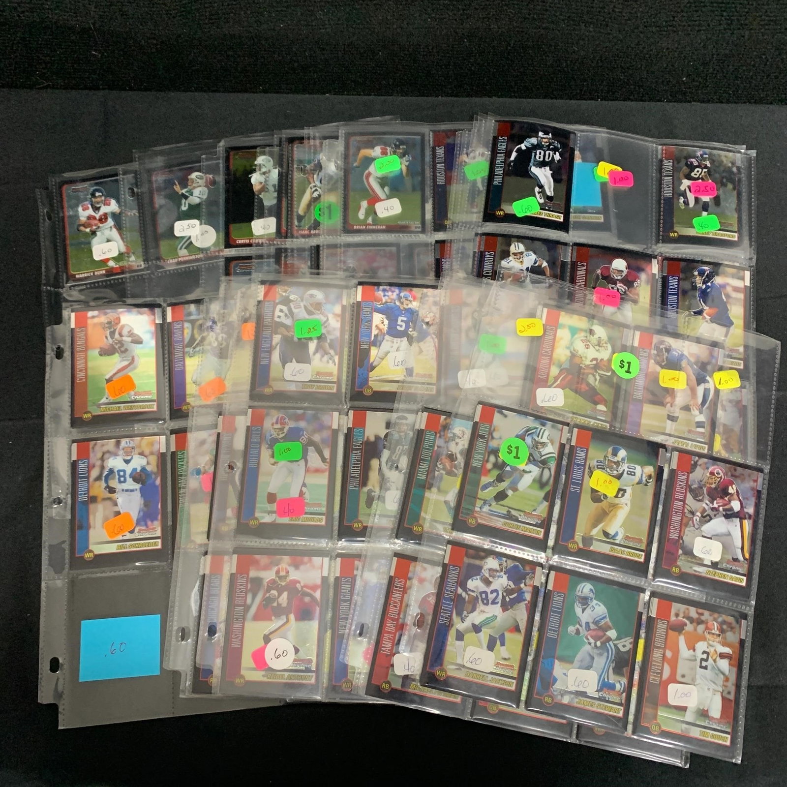 2002 Bowman Chrome Football Cards: 100s of 2002 Bowman Chrome Football Cards. Approximately 20 pages. Cards are stacked in pages. We are a veteran owned company. Please look at the pictures carefully to determine what you believe the c