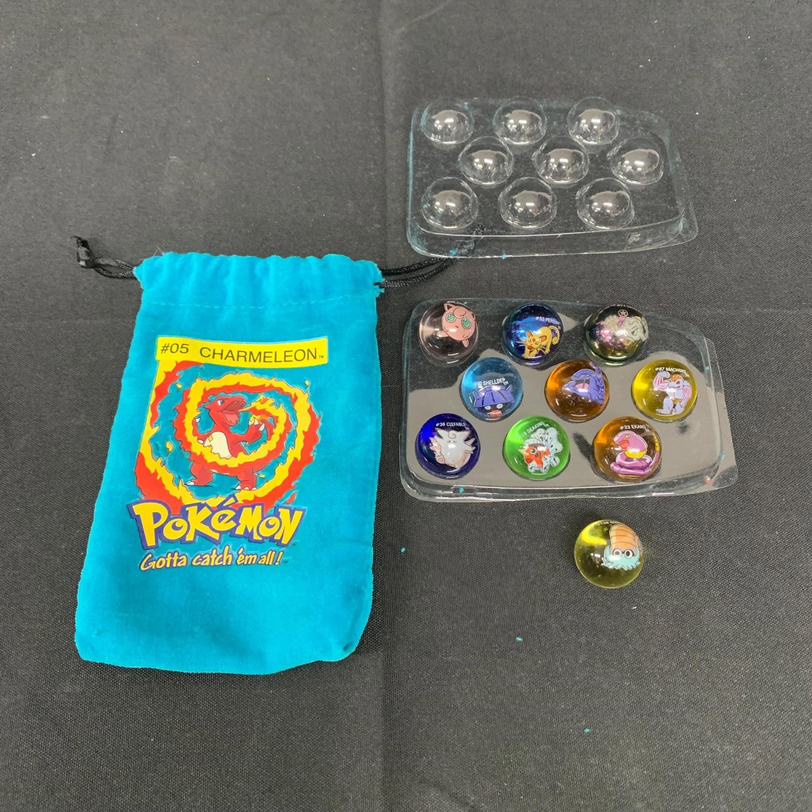 1998 Charmeleon Pokemon Marble Set: Includes 10 Vintage Pokemon Marbles. We are a veteran owned company. Please look at the pictures carefully to determine what you believe the condition of collectible is. We are currently accepting con