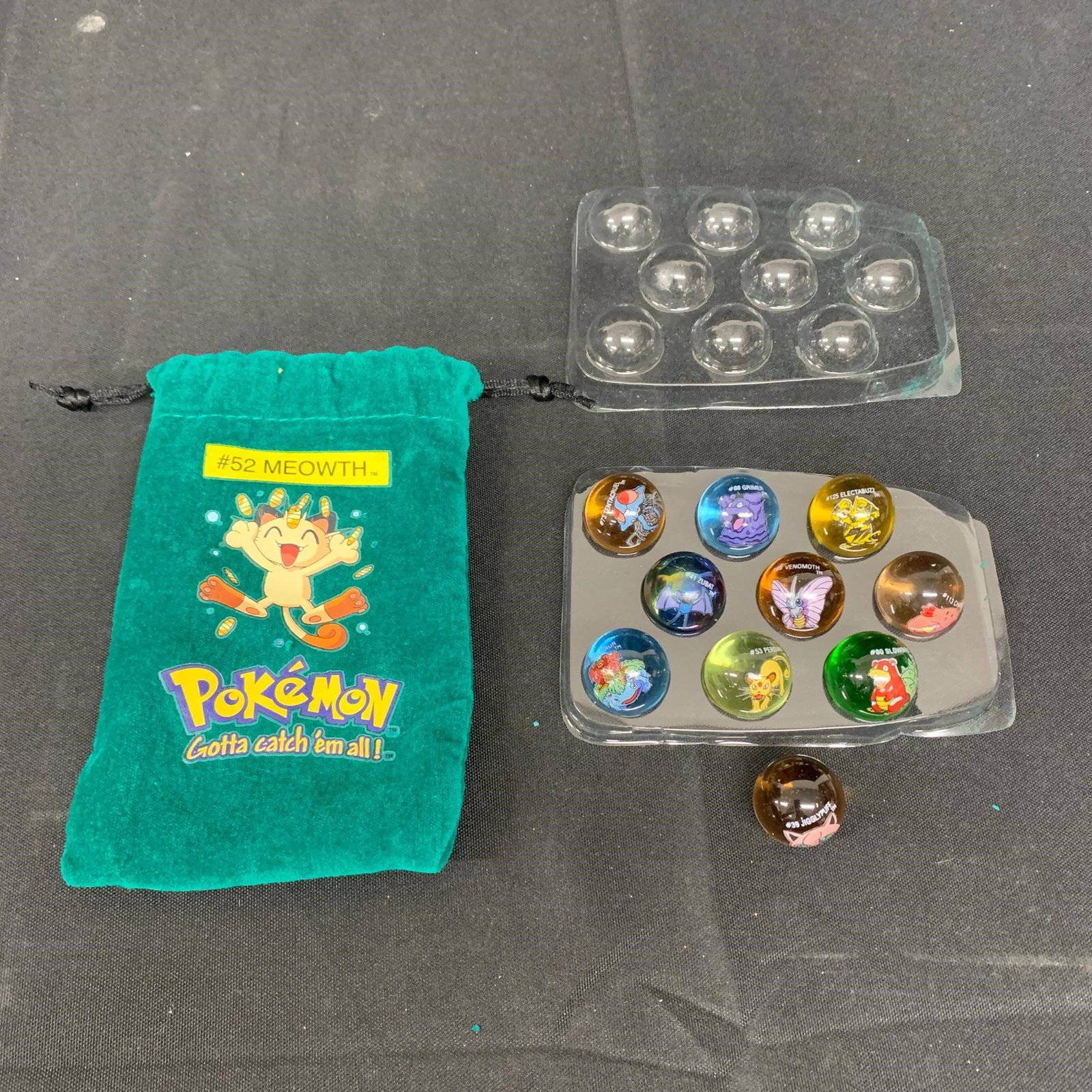 1998 Meowth Pokemon Marbles: RARE 1998 Meowth vintage Pokemon Marbles. We are a veteran owned company. Please look at the pictures carefully to determine what you believe the condition of collectible is. We are currently acceptin