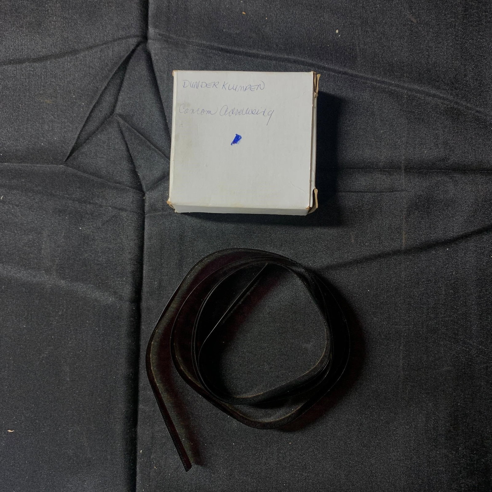 8mm Film in Box Hard to Read Title: The estate was a film maker who made movie trailers for movie studios and the estate contains a lot of his original trailers and movie reels and TV shows. He was also a comic writer and had access to 