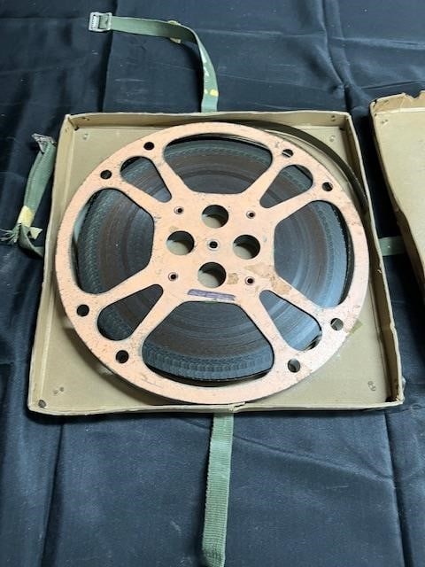 2 8mm Reels 'Peter Gunn' In Case: 2 8mm reels in carry case with "Peter Gunn" written on it. We are a veteran owned company. Please look at the pictures carefully to determine what you believe the condition of collectible is. We are c