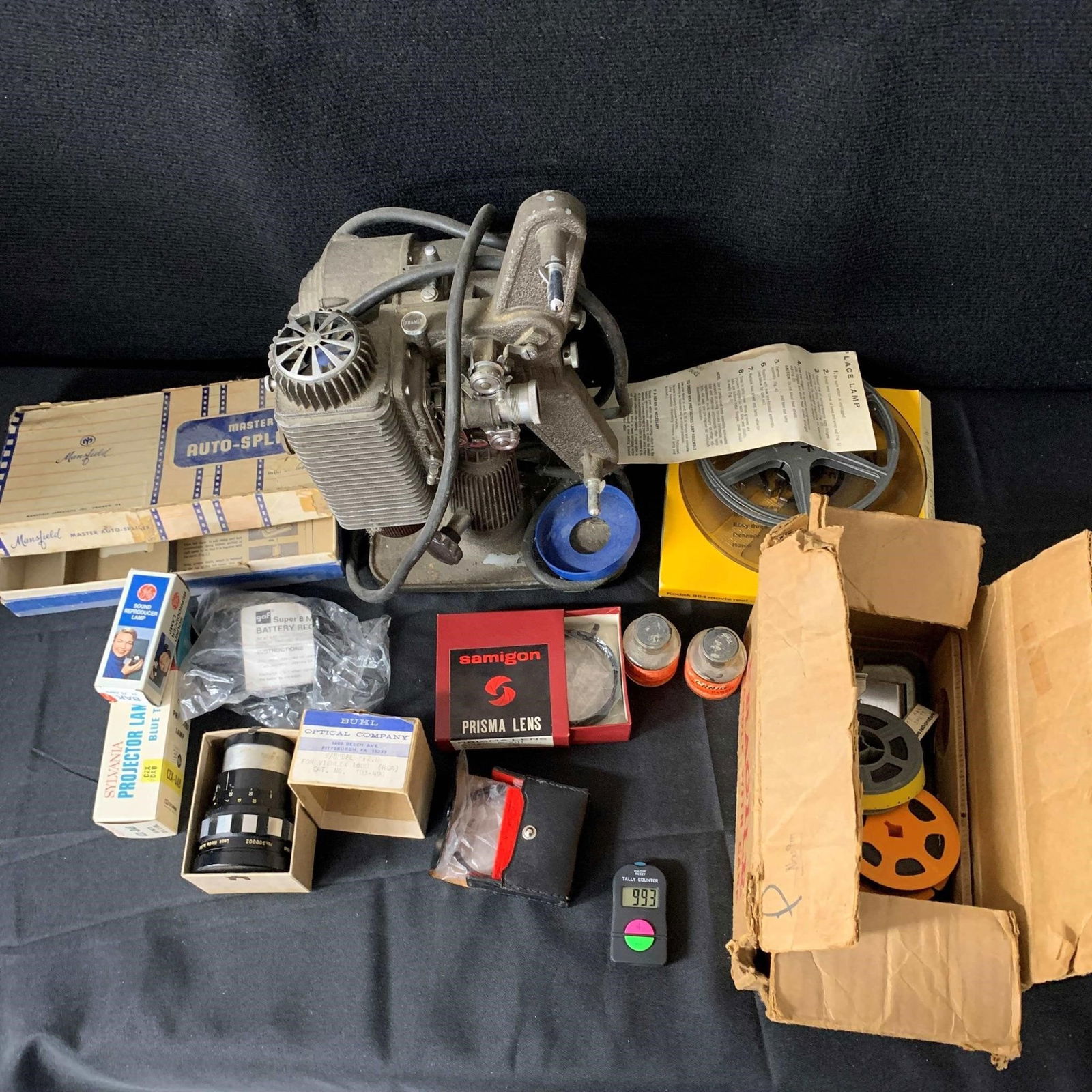 Movie Projector w/auto splicer & Supplies: Projector and Splicer were not tested for this auction. We are a veteran owned company. Please look at the pictures carefully to determine what you believe the condition of collectible is. We are curr
