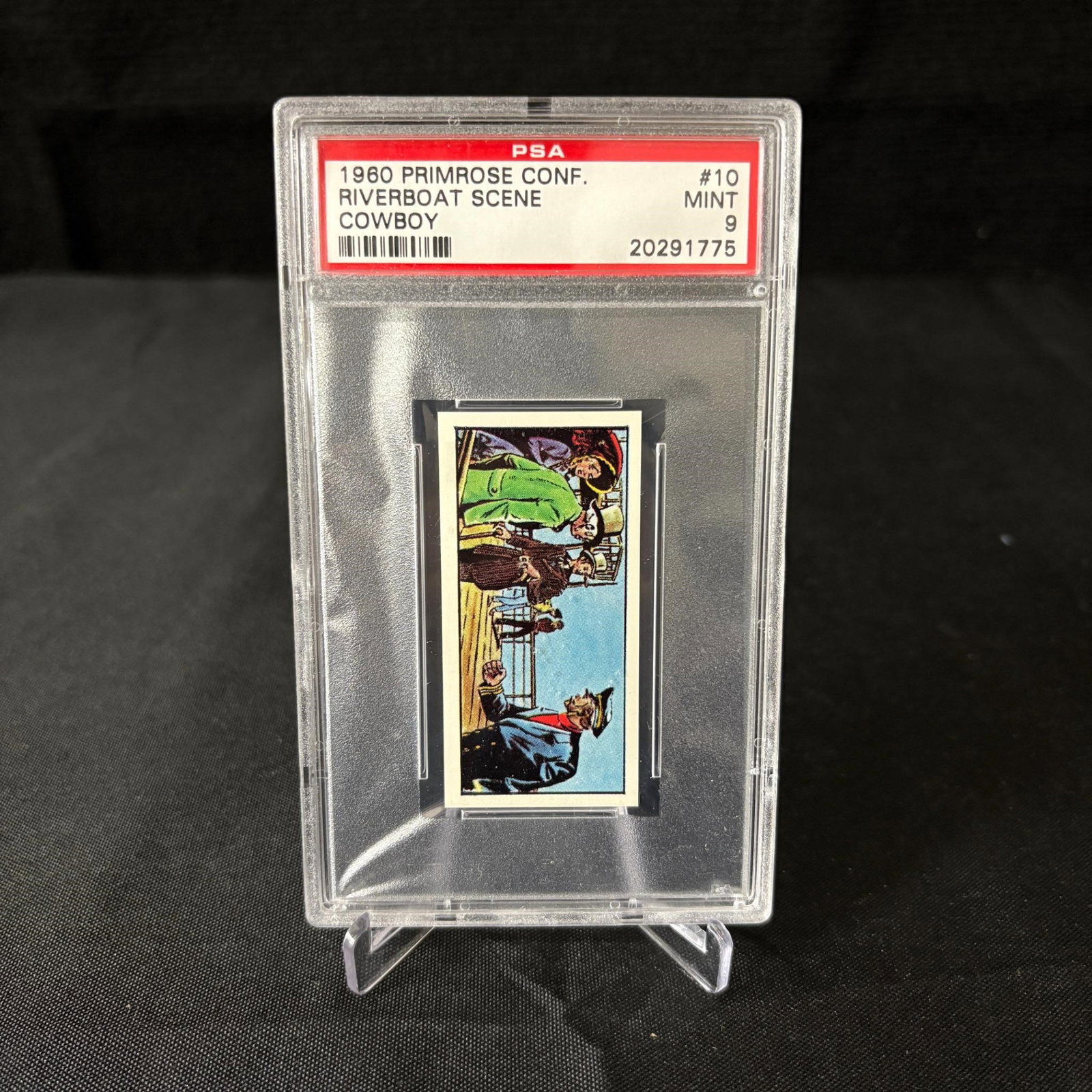 PSA 9 Riverboat Scene 1960 Primrose: PSA 9 Riverboat Scene #10 Cowboy set 1960 Primrose Tobacco Card. We are a veteran owned company. Please look at photos carefully. All items are available for virtual preview by appointment. As a resul