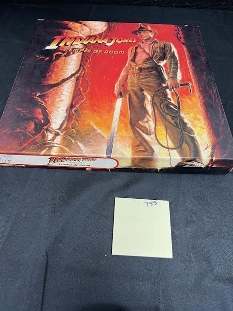 Indiana Jones & the Temple of Doom Jigsaw Puzzle: Notation inside the box indicates that someone checked the pieces in 2006 and wrote "ok" We assume that meant in 2006 that the puzzle was complete, but we did not count or attempt to put the puzzle to