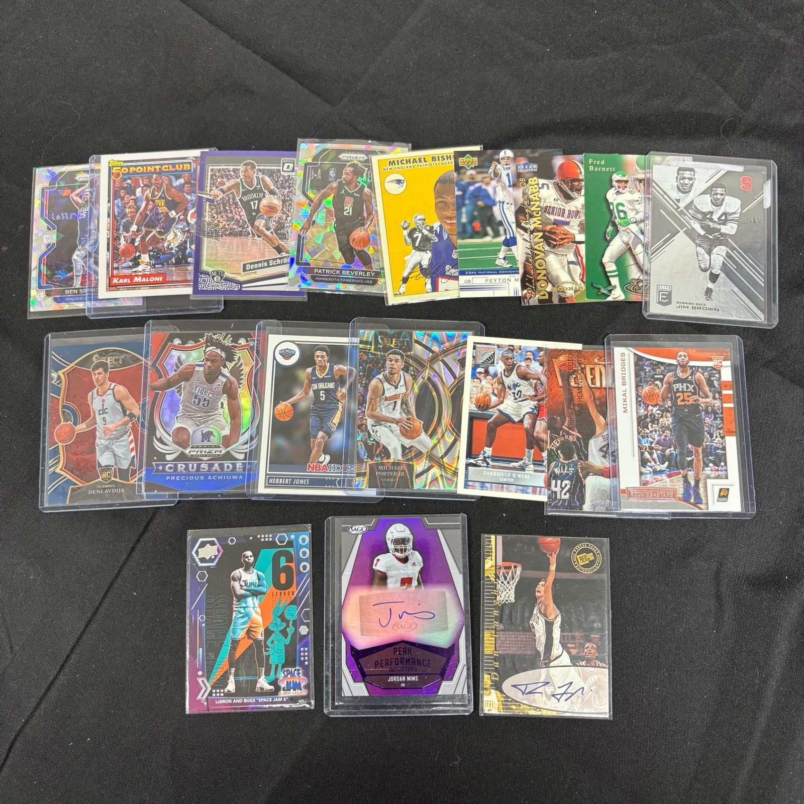 Group of Modern Sports Cards: Please look at photos carefully. All sales are final. Items sold as is. We offer virtual and in person previews of any lots up until auction day. By placing a bid you agree to allow us to charge the c