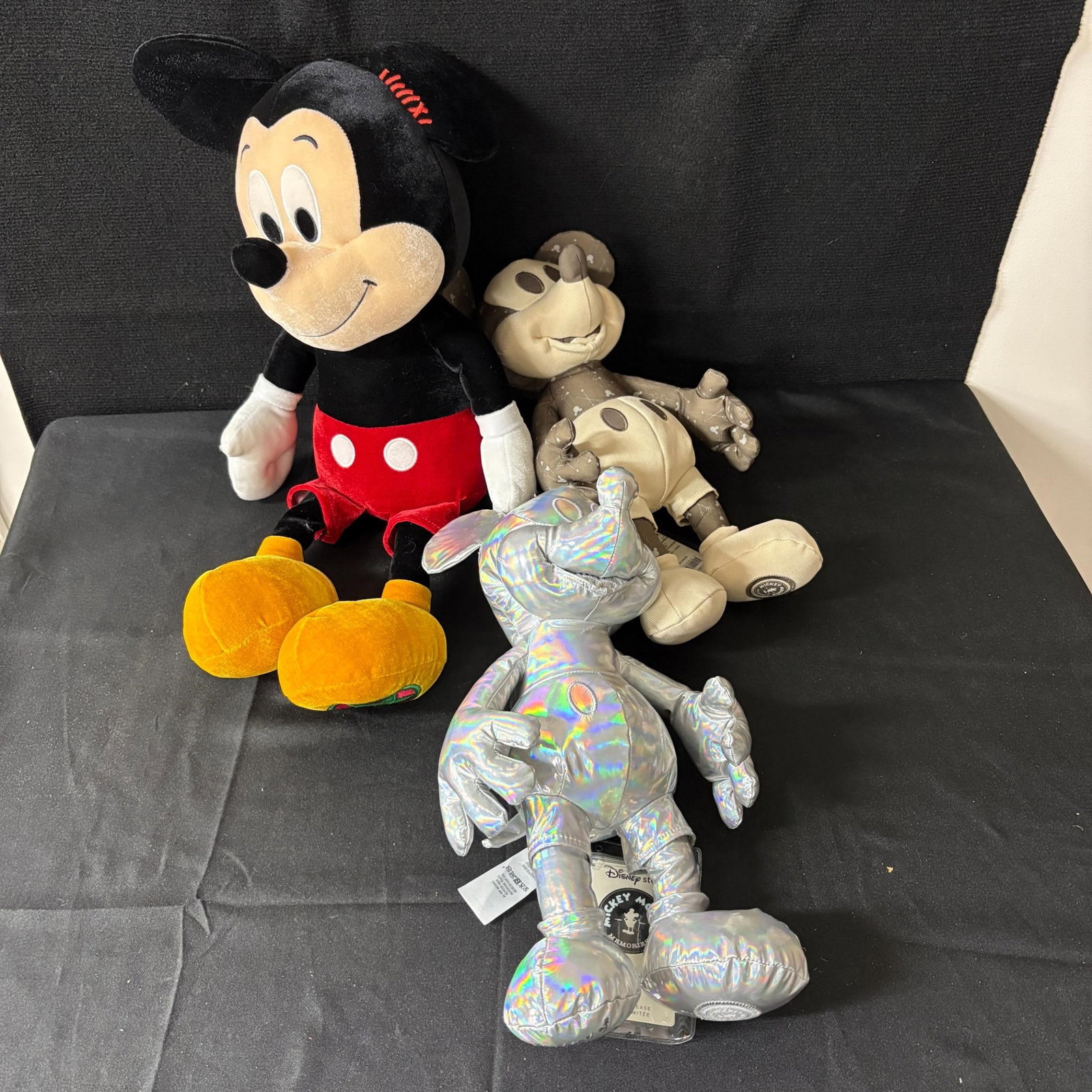 Disney Store Limited Ed. Plushies NWT: Please look at photos carefully. All sales are final. Items sold as is. We offer virtual and in person previews of any lots up until auction day. By placing a bid you agree to allow us to charge the c