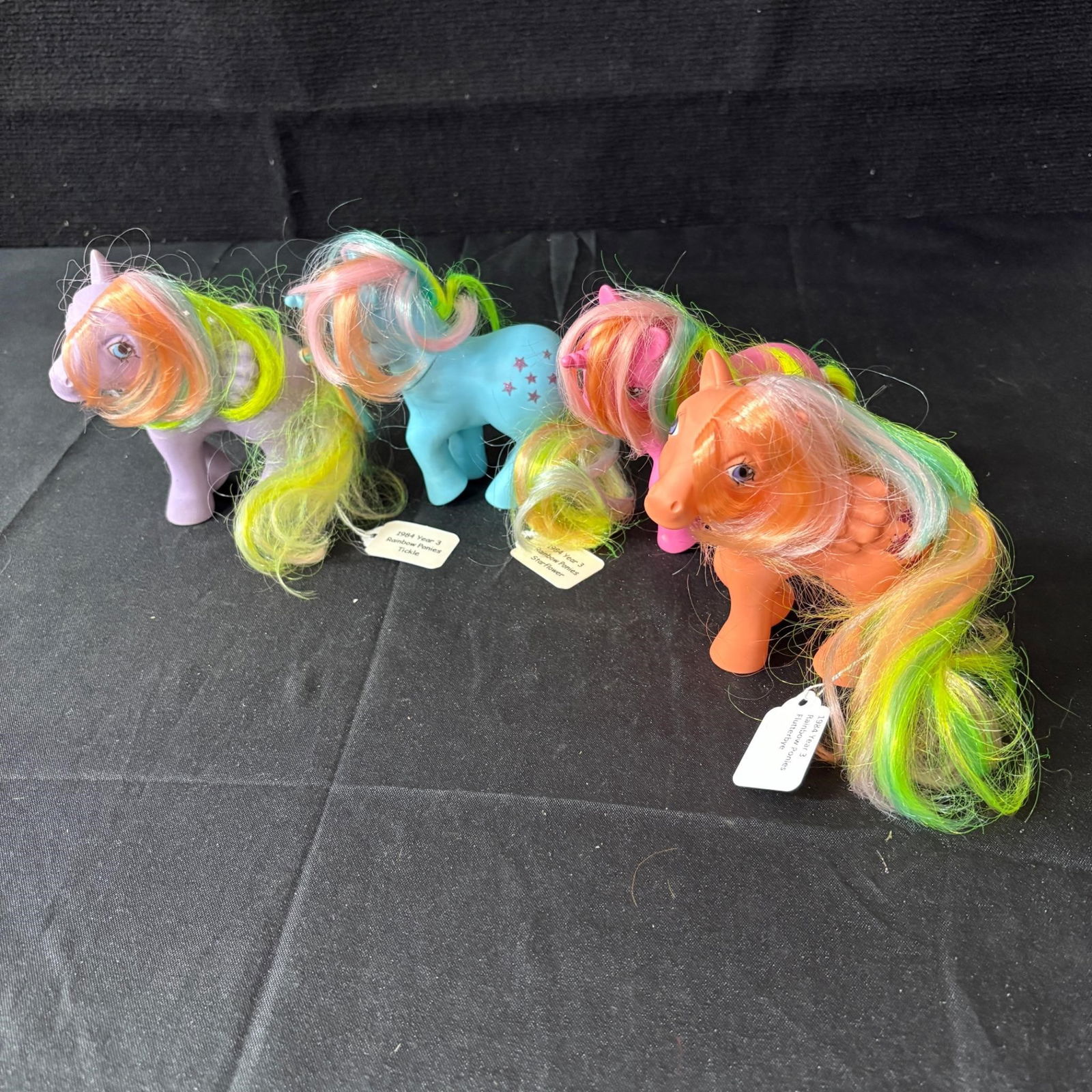 1984 Year 3 My Little Ponies Rainbow Ponies: My Little Ponies year 3 Rainbow Ponies, includes Tickle and Starflower. Please look at photos carefully. All sales are final. Items sold as is. We offer virtual and in person previews of any lots up u