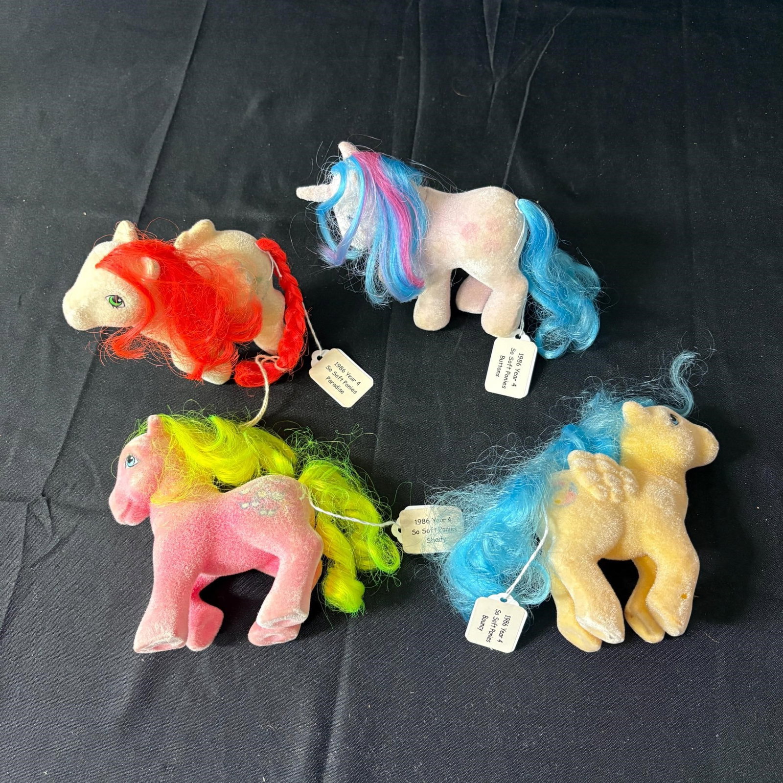1986 Year 4 My Little Ponies So Soft Ponies: Includes Paradise, buttons, Shady & Bouncy. Please look at photos carefully. All sales are final. Items sold as is. We offer virtual and in person previews of any lots up until auction day. By placing