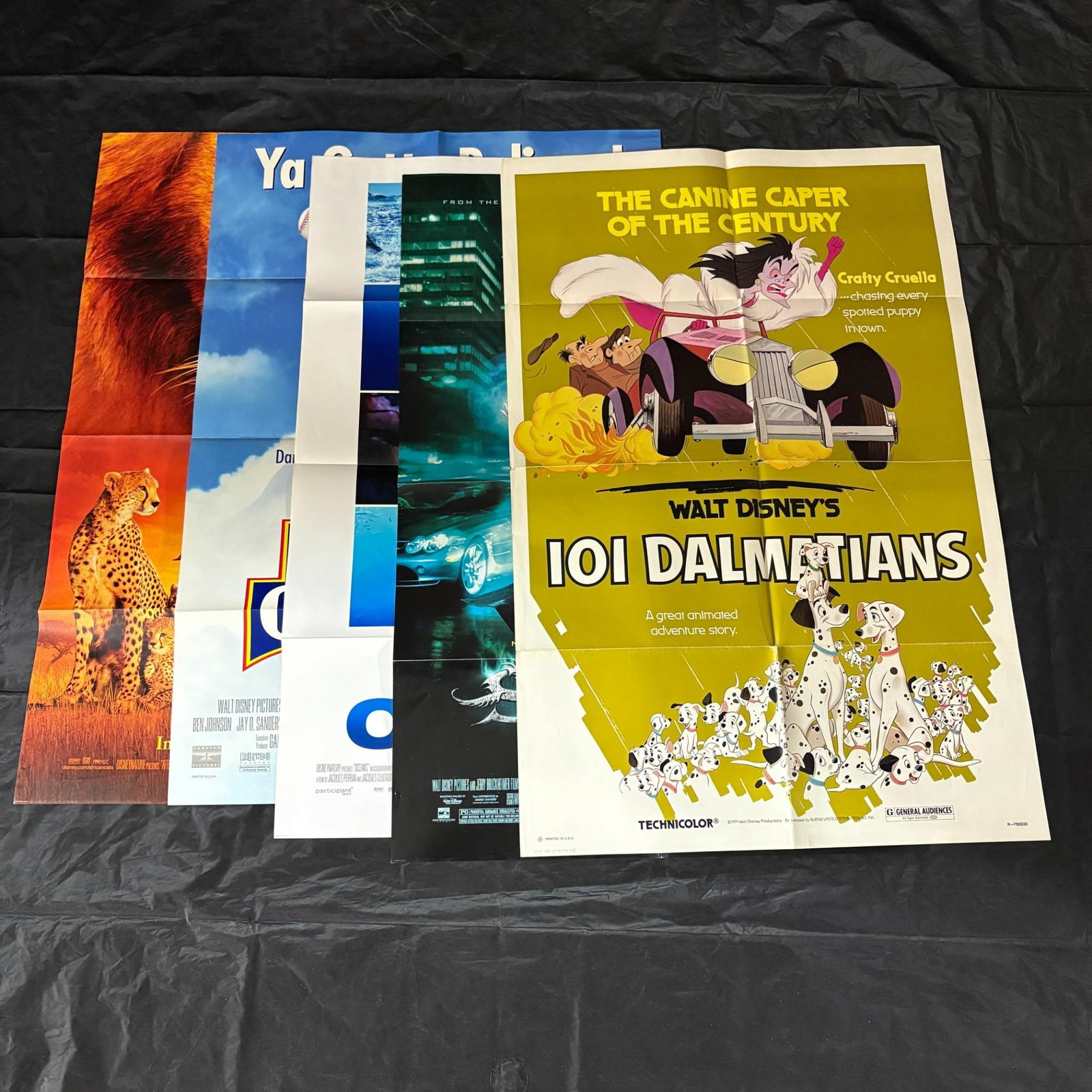 Disney Movie Poster Lot, 101 Dalmatians: Please look at photos carefully. All sales are final. Items sold as is. We offer virtual and in person previews of any lots up until auction day. By placing a bid you agree to allow us to charge the c