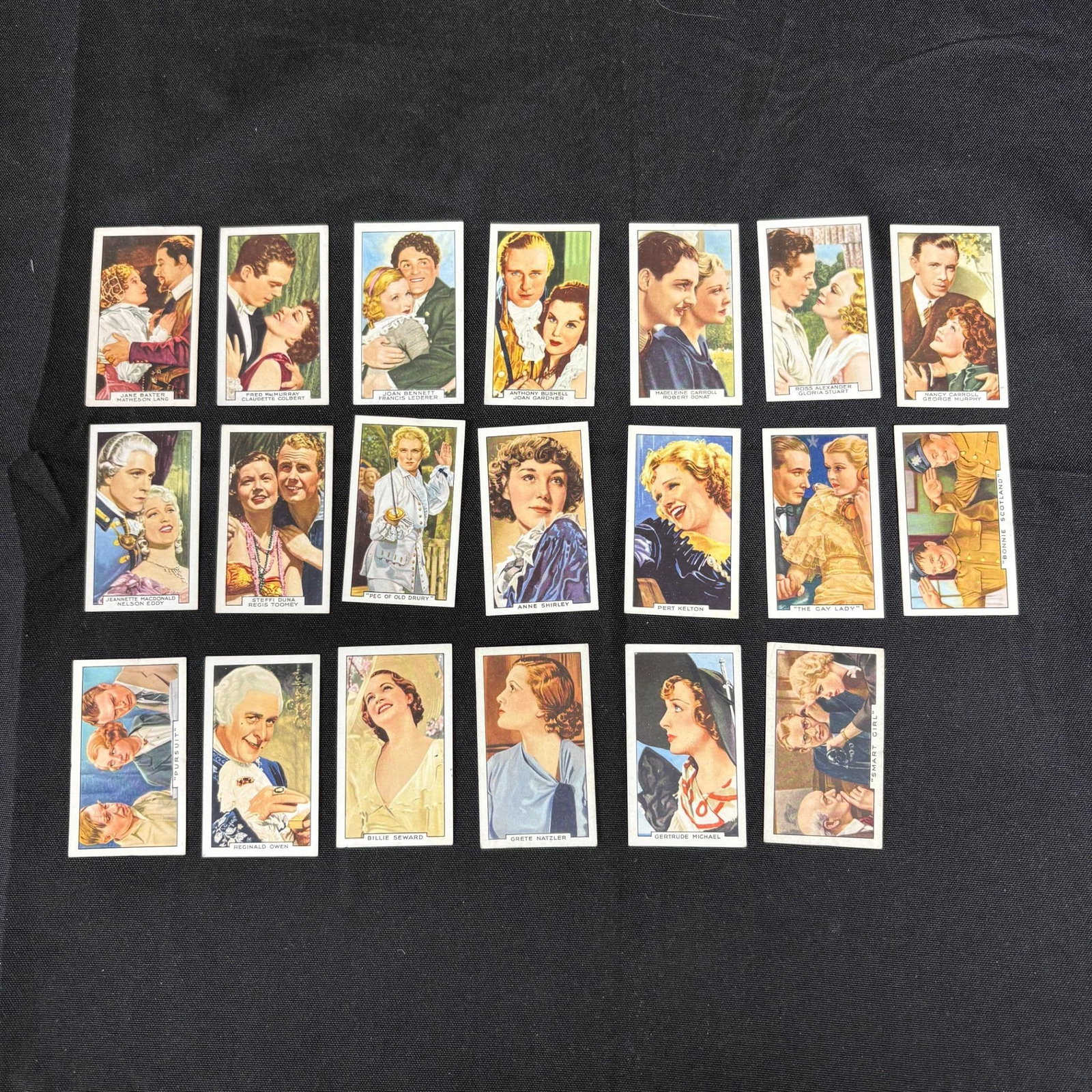 Nice lot of 1930s Gallaher Tobacco Cards: Includes cards from the Film Partners, Portraits of Famous Stars, and Film episodes sets. Please look at photos carefully. All sales are final. Items sold as is. We offer virtual and in person preview