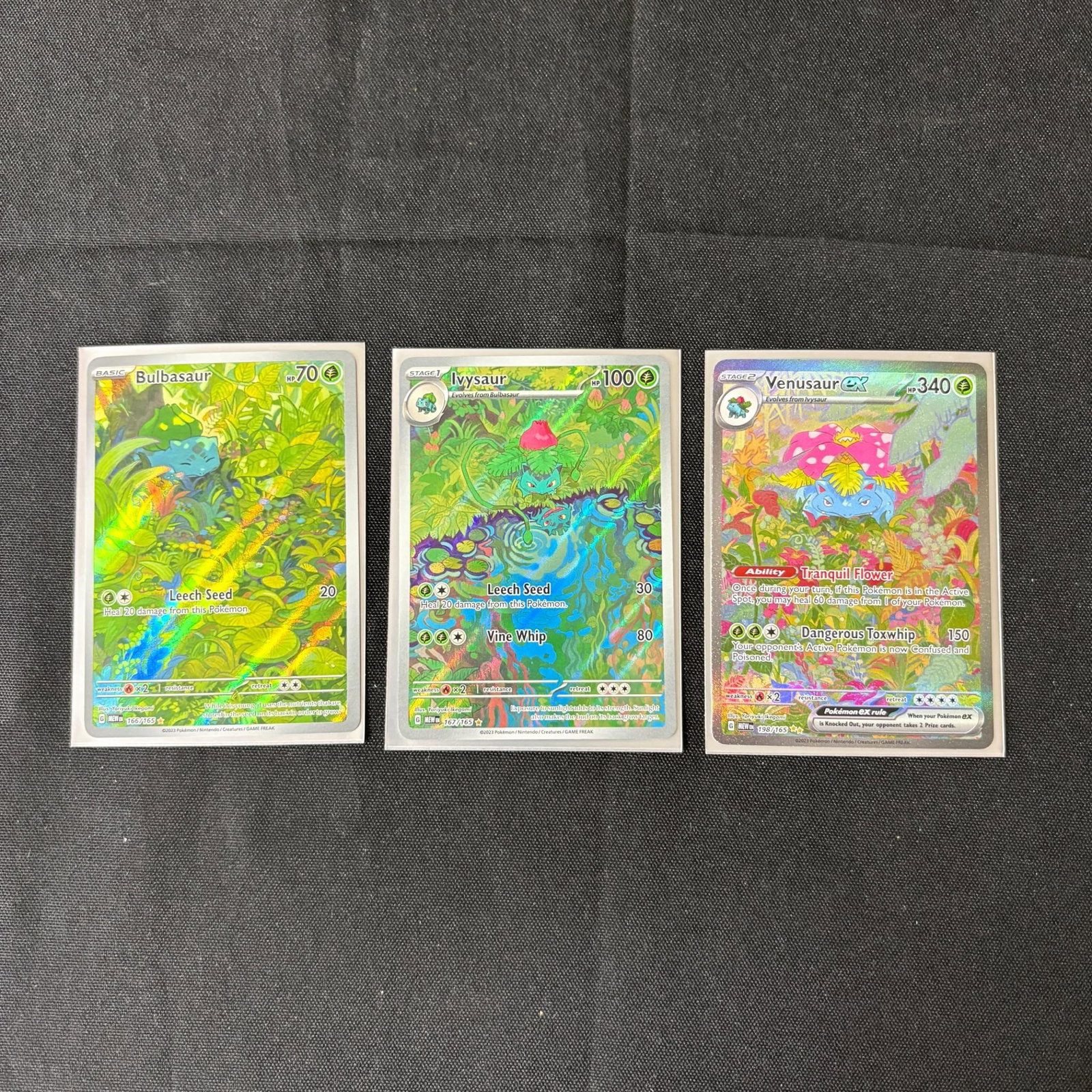 Venusaur EX SIR, Ivysaur, Bulbasaur 151: Venusaur EX #198 SIR, Ivysaur #167 Illustration Rare, Bulbasaur #166 Illustration Rare. English 151 Pokemon Cards. Please look at photos carefully. All sales are final. Items sold as is. We offer virt