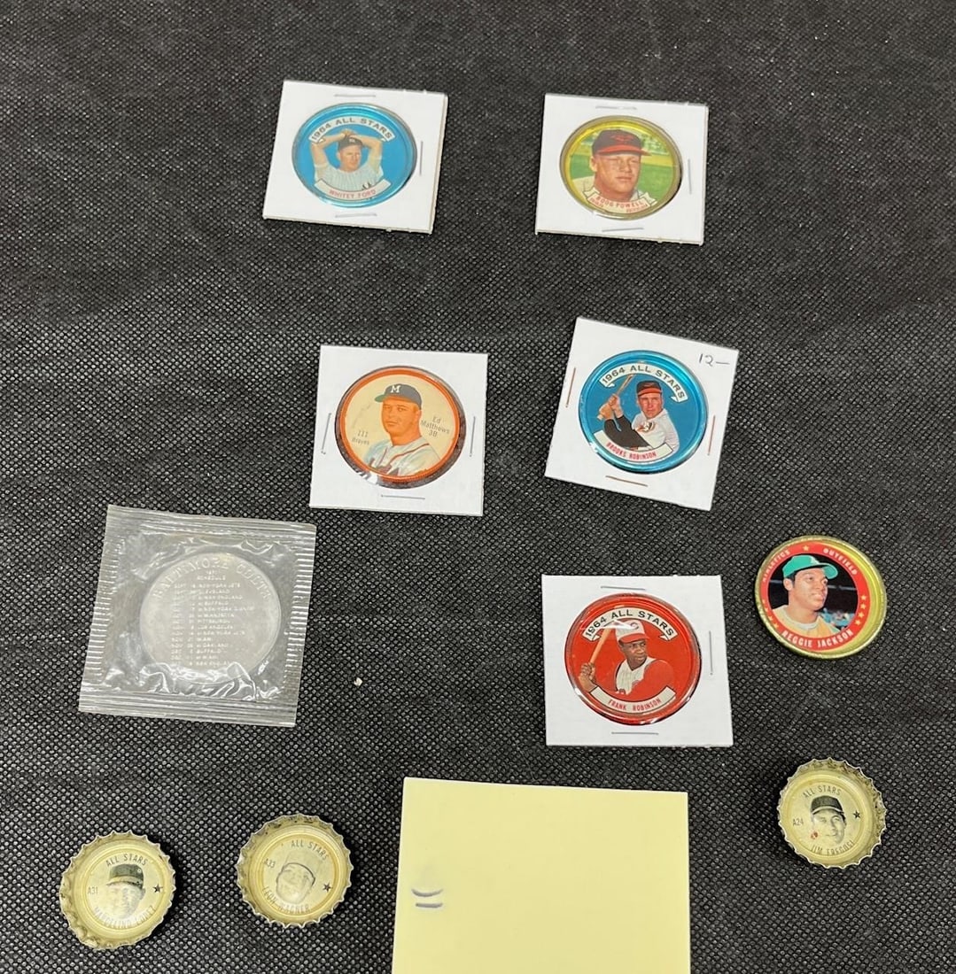 vintage topps & salada coins featuring hofâ€™s +: Included in this lot are coins of Hall of Famers Frank Robinson, Brooks Robinson, Eddie Matthews, Whitey Ford, and Reggie Jackson. A vintage Baltimore colts, schedule coin and baseball player Coke bot