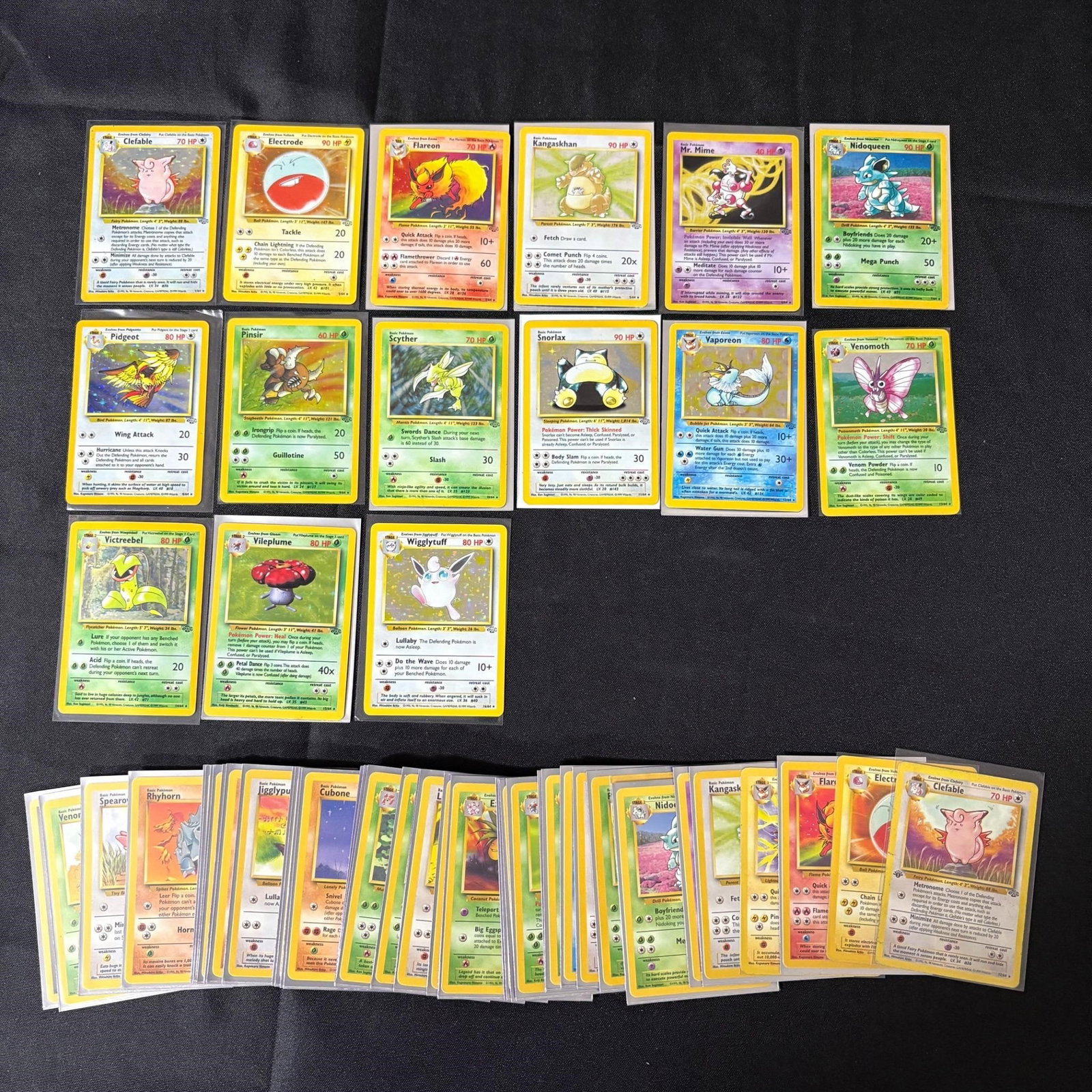 Near Complete Vintage Jungle Set Pokemon Cards: Near Complete set of Vintage Jungle Set Pokemon Cards. All items are sold as is. Please look at pictures carefully to determine what you believe are the condition of each lot. By choosing which card t