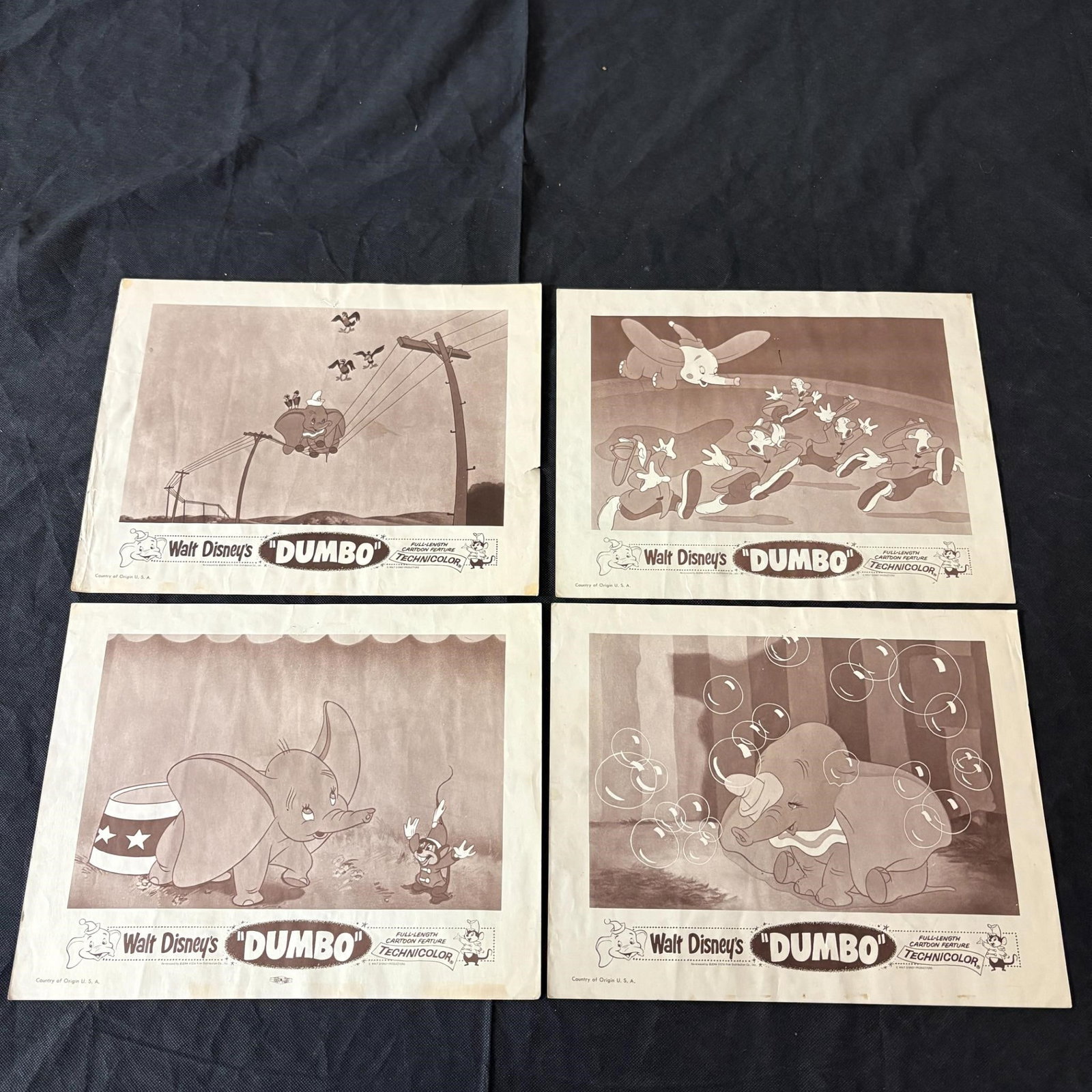Walt Disney's Dumbo Lobby Card, 1959 Lot: All items are sold as is. Please look at pictures carefully to determine what you believe are the condition of each lot. By choosing which card to use to register to bid, you authorize us to use the c