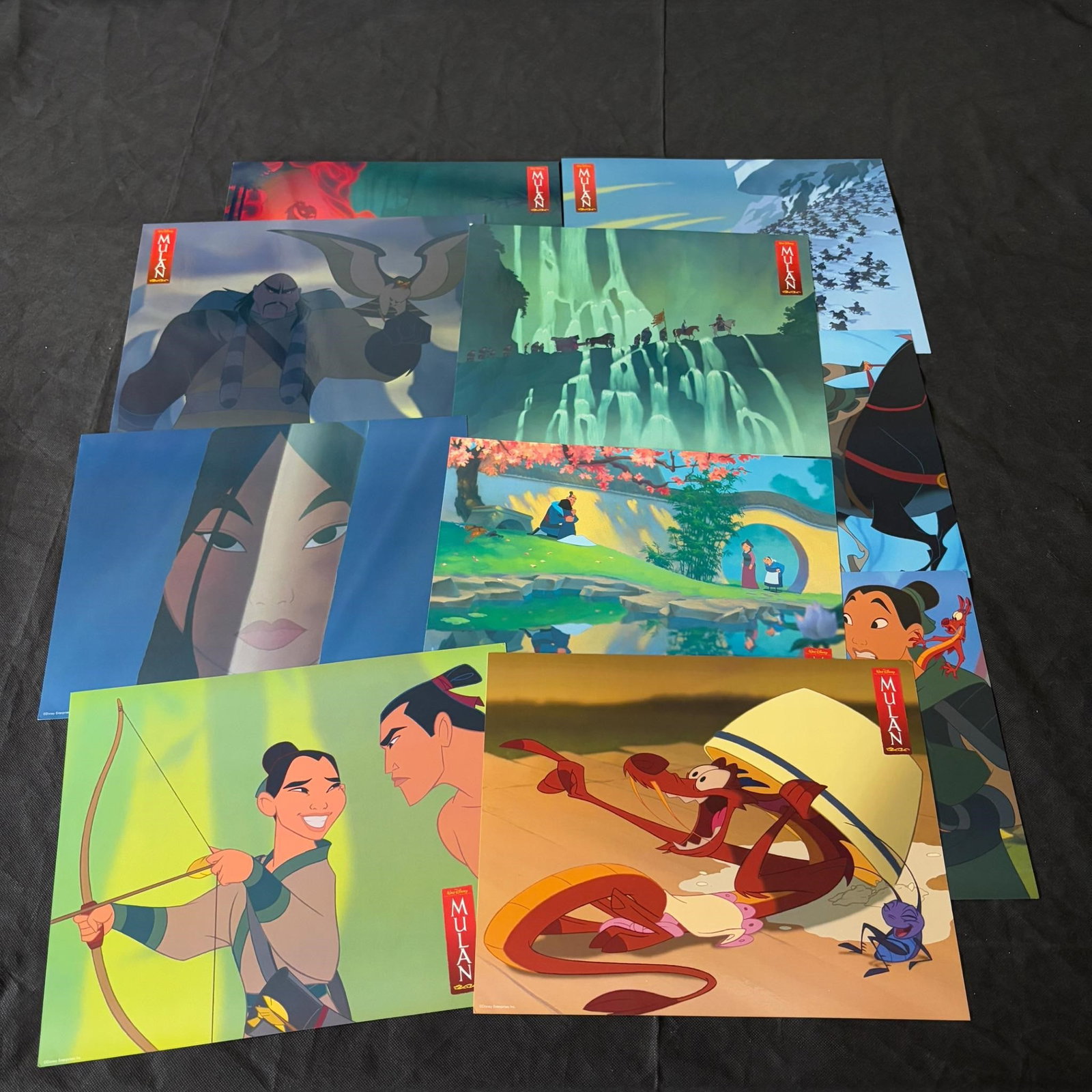 Disney's Mulan Original Lobby Card Set: All items are sold as is. Please look at pictures carefully to determine what you believe are the condition of each lot. By choosing which card to use to register to bid, you authorize us to use the c