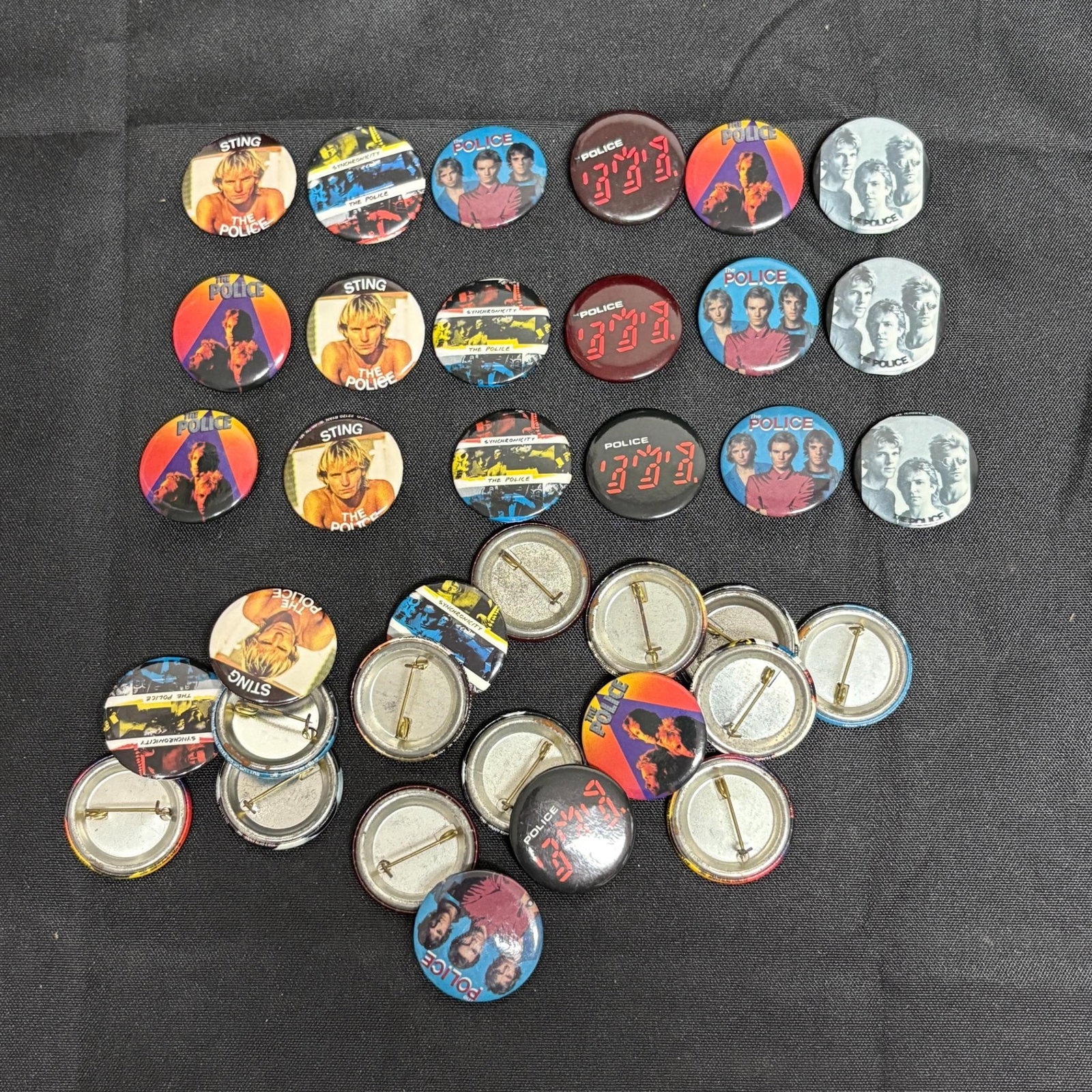 1980s Band Buttons, Police, Sting: Vintage 1980 Band Buttons Featuring the bands Police and Sting. All items are sold as is. Please look at pictures carefully to determine what you believe are the condition of each lot. By choosing whi