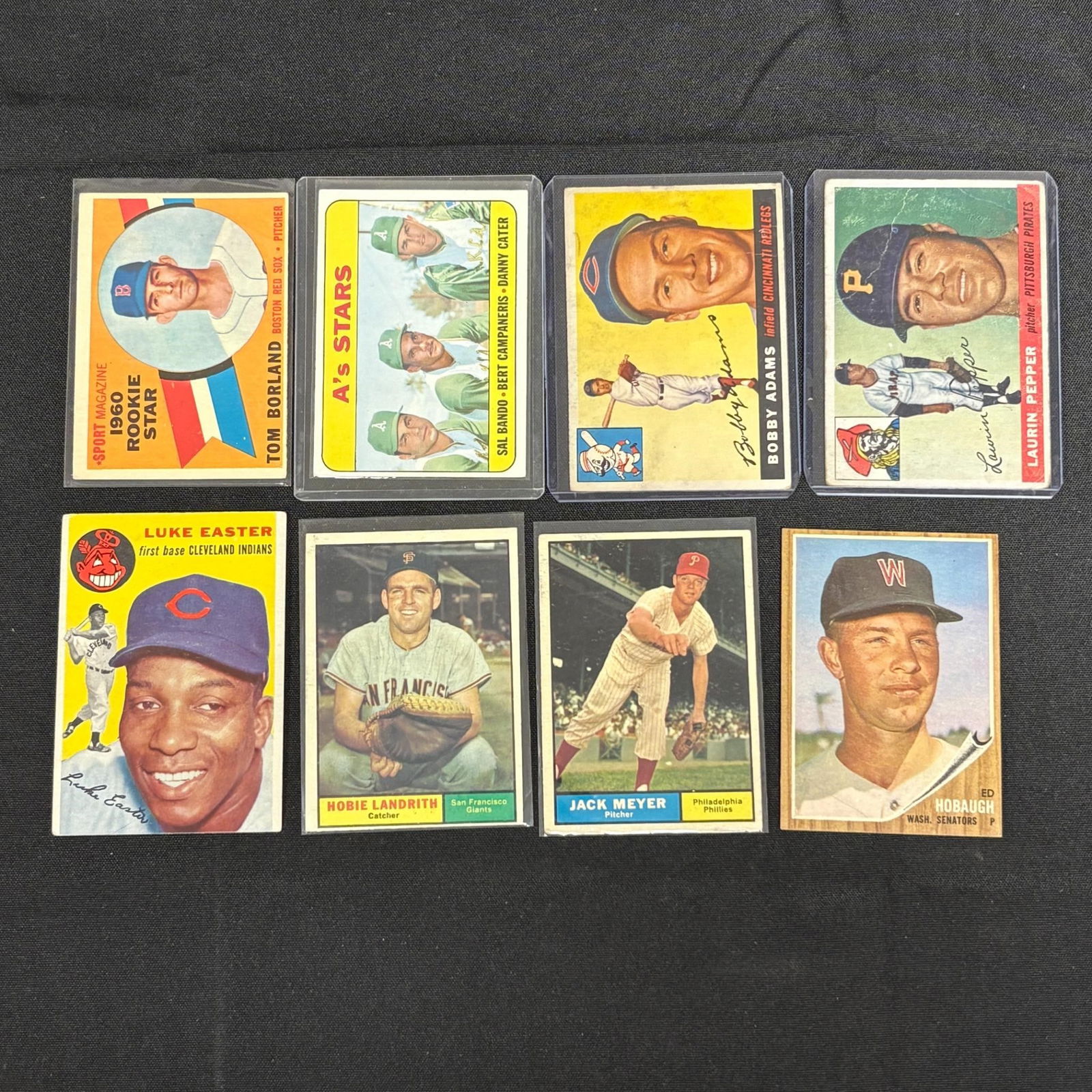1950s and 60s Topps Baseball Cards: Tom Borland #117, Luke Easter #23, A's Stars #556, Hobie Landrith #114, Robert Adams #178, Ed Hobaugh #79, Hugh Pepper #147. All items are sold as is. Please look at pictures carefully to determine wh