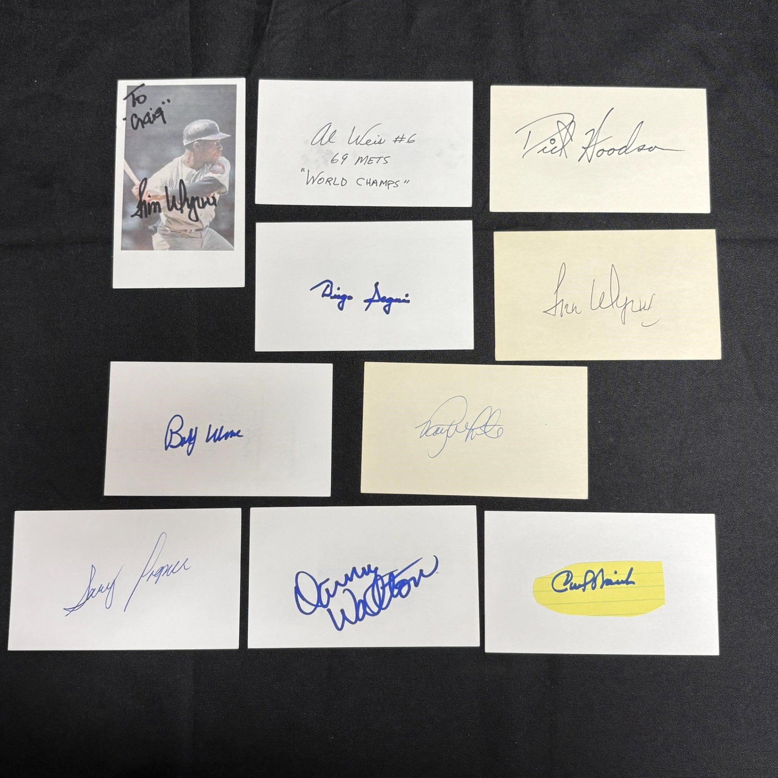 Signed Baseball Player Index Cards: Large lot of baseball player signatures. Includes Jim Wynn, Roy White, Carl Warwick, Gary Wagner, Dick Woodson, Al Weiss, Bobby Wine. All items are sold as is. Please look at pictures carefully to det