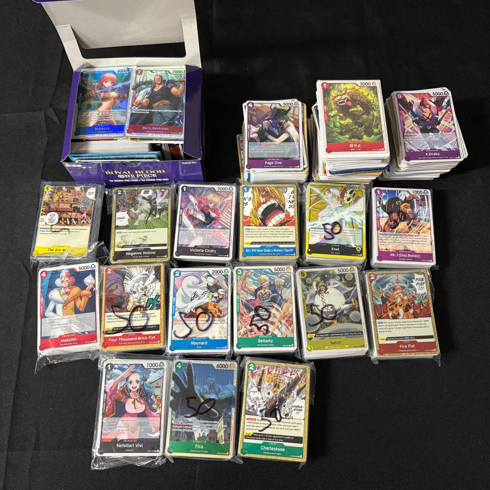 Huge lot of One Piece Trading Cards: Approx 1000 One Piece Trading Cards. Includes Foils and Bulk. Various Years and sets. All items are sold as is. Please look at pictures carefully to determine what you believe are the condition of eac