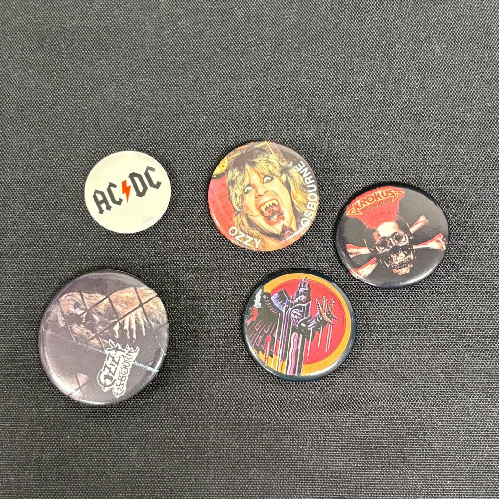 1980s Rock N Roll Pins, Ozzy, ACDC: All items are sold as is. Please look at pictures carefully to determine what you believe are the condition of each lot. By choosing which card to use to register to bid, you authorize us to use the c