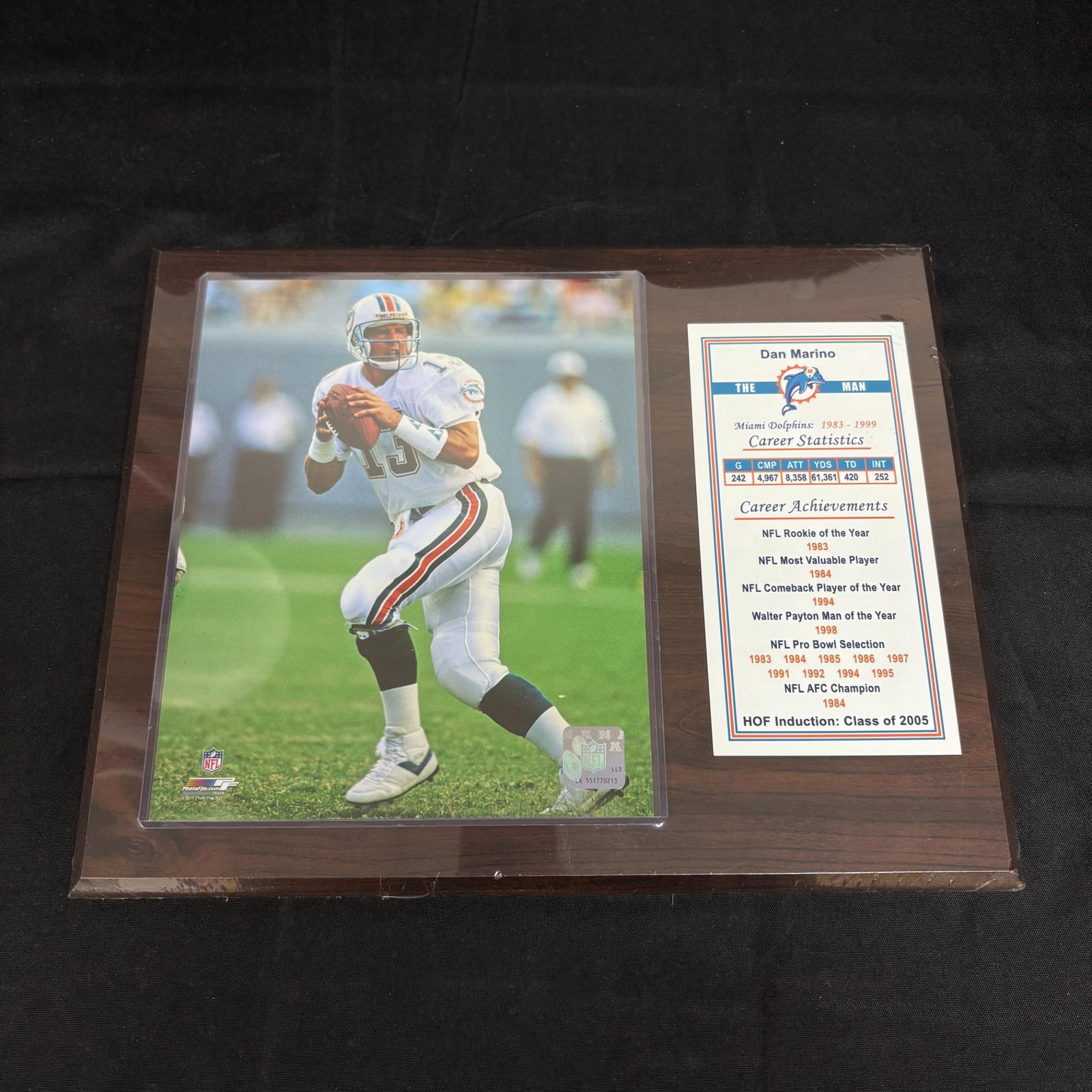 Dan Marino Plaque, HOF Class of 2005: Plaque of Football Player Dan Marino. All items are sold as is. Please look at pictures carefully to determine what you believe are the condition of each lot. By choosing which card to use to register