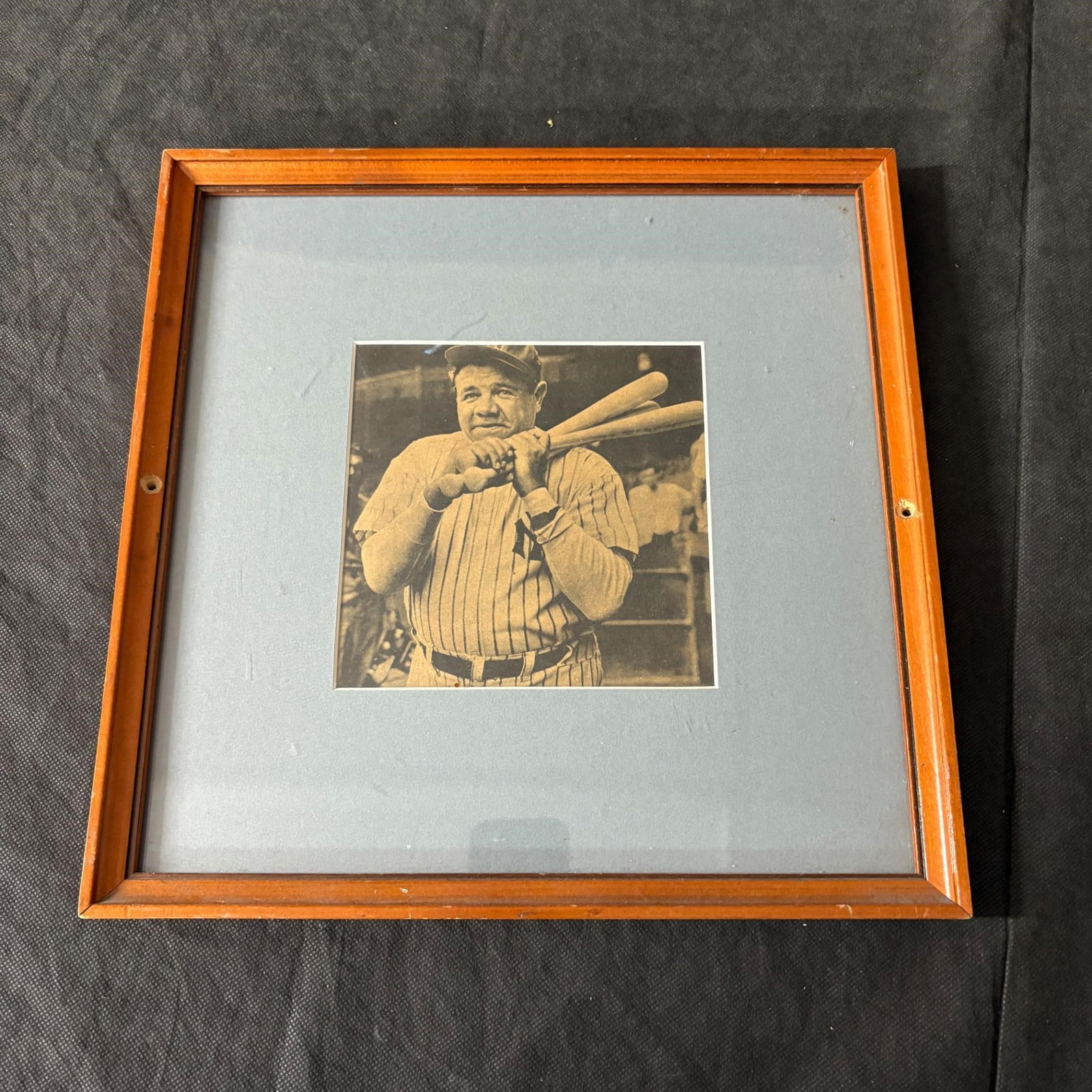 Babe Ruth Newspaper Photo in Frame: All items are sold as is. Please look at pictures carefully to determine what you believe are the condition of each lot. By choosing which card to use to register to bid, you authorize us to use the c