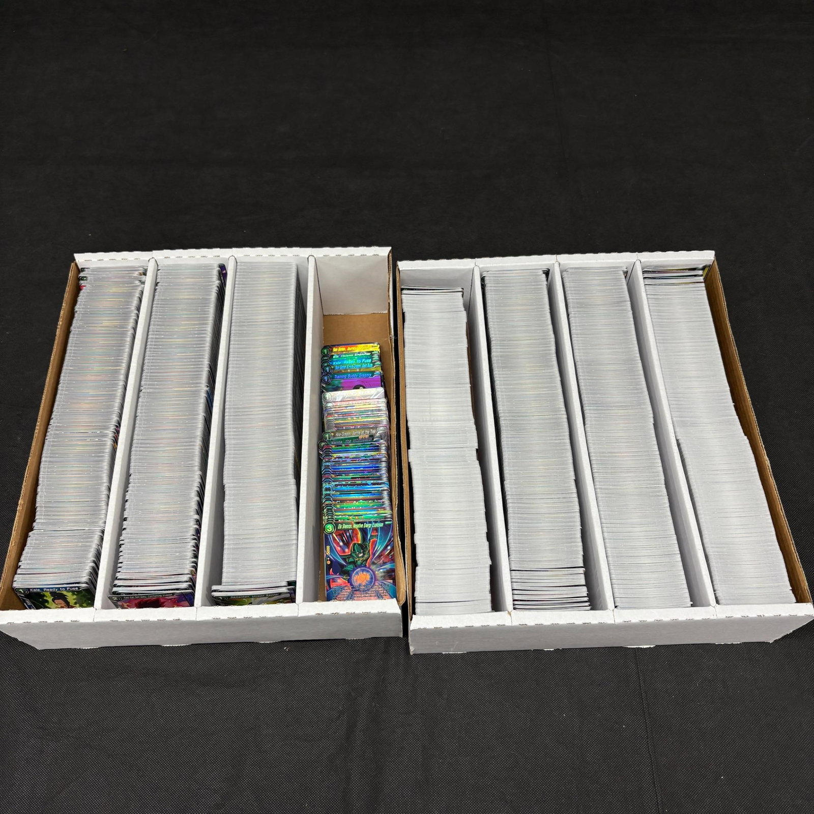 1000s of Dragon Ball Z Trading Cards: 1000s Of Dragon Ball Z Trading Cards, includes Foils. All items are sold as is. Please look at pictures carefully to determine what you believe are the condition of each lot. By choosing which card to