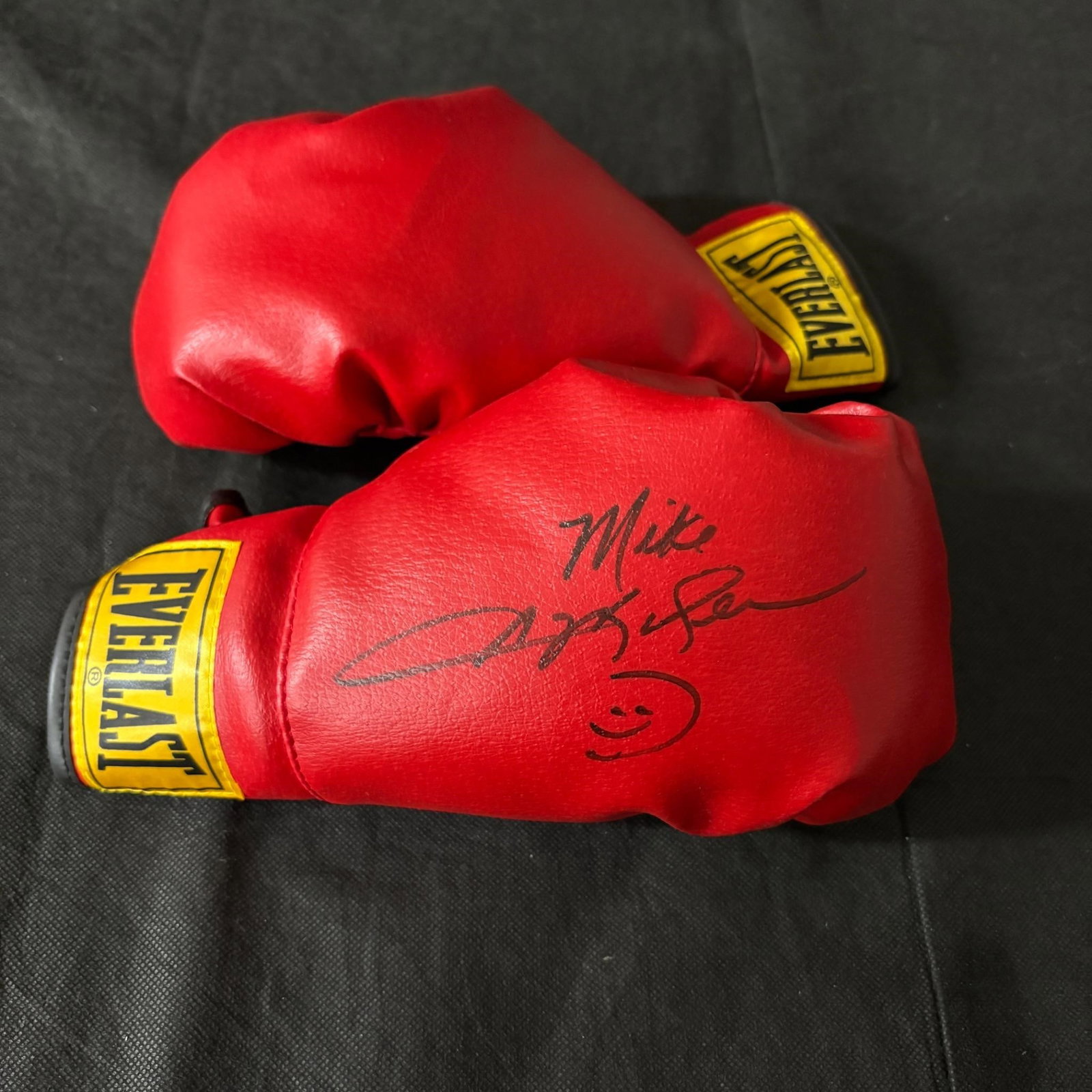 Signed Boxing Glove: All items are sold as is. Please look at pictures carefully to determine what you believe are the condition of each lot. By choosing which card to use to register to bid, you authorize us to use the c