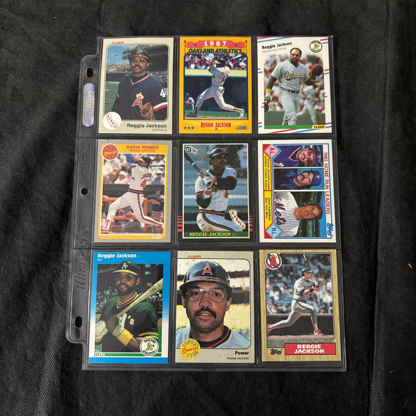SHEET OF 9 HOF REGGIE JACKSON CARDS (1 of 2)