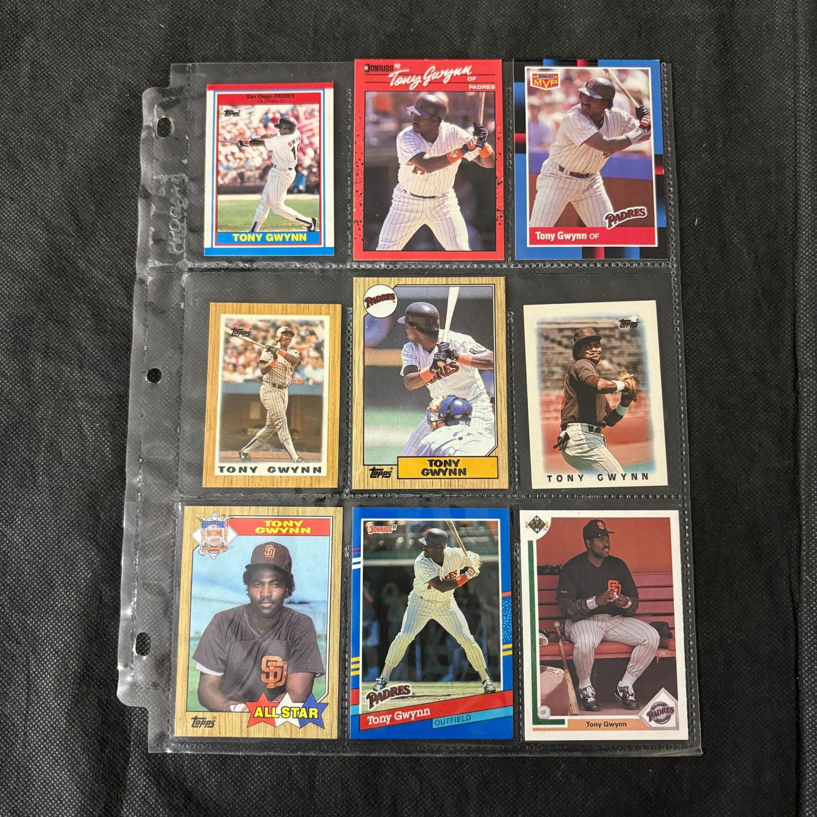 SHEET OF 9 HOF TONY GWYNN CARDS: All items are sold as is. Please look at pictures carefully to determine what you believe are the condition of each lot. By choosing which card to use to register to bid, you authorize us to use the c
