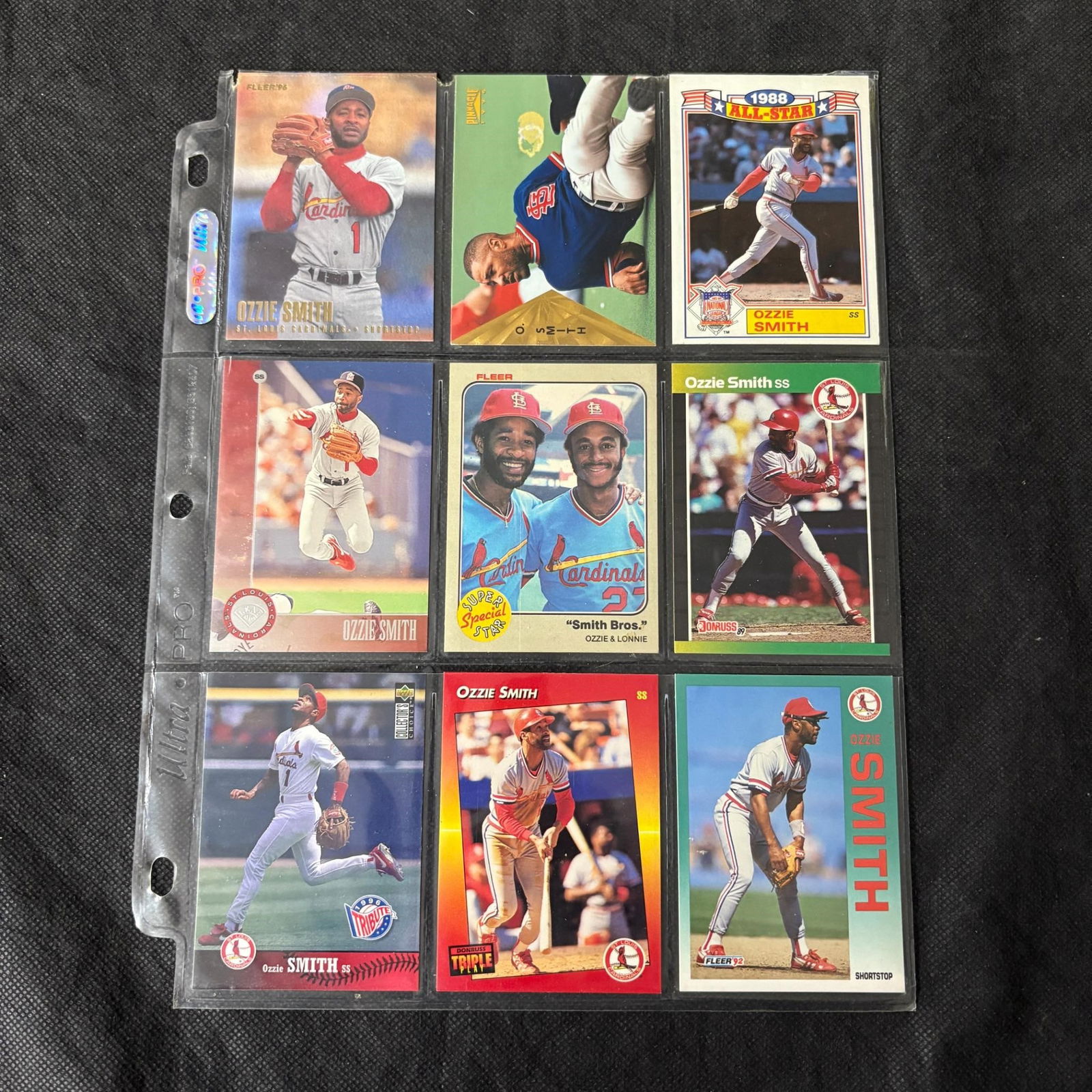 SHEET OF 9 HOF OZZIE SMITH CARDS (1 of 2)