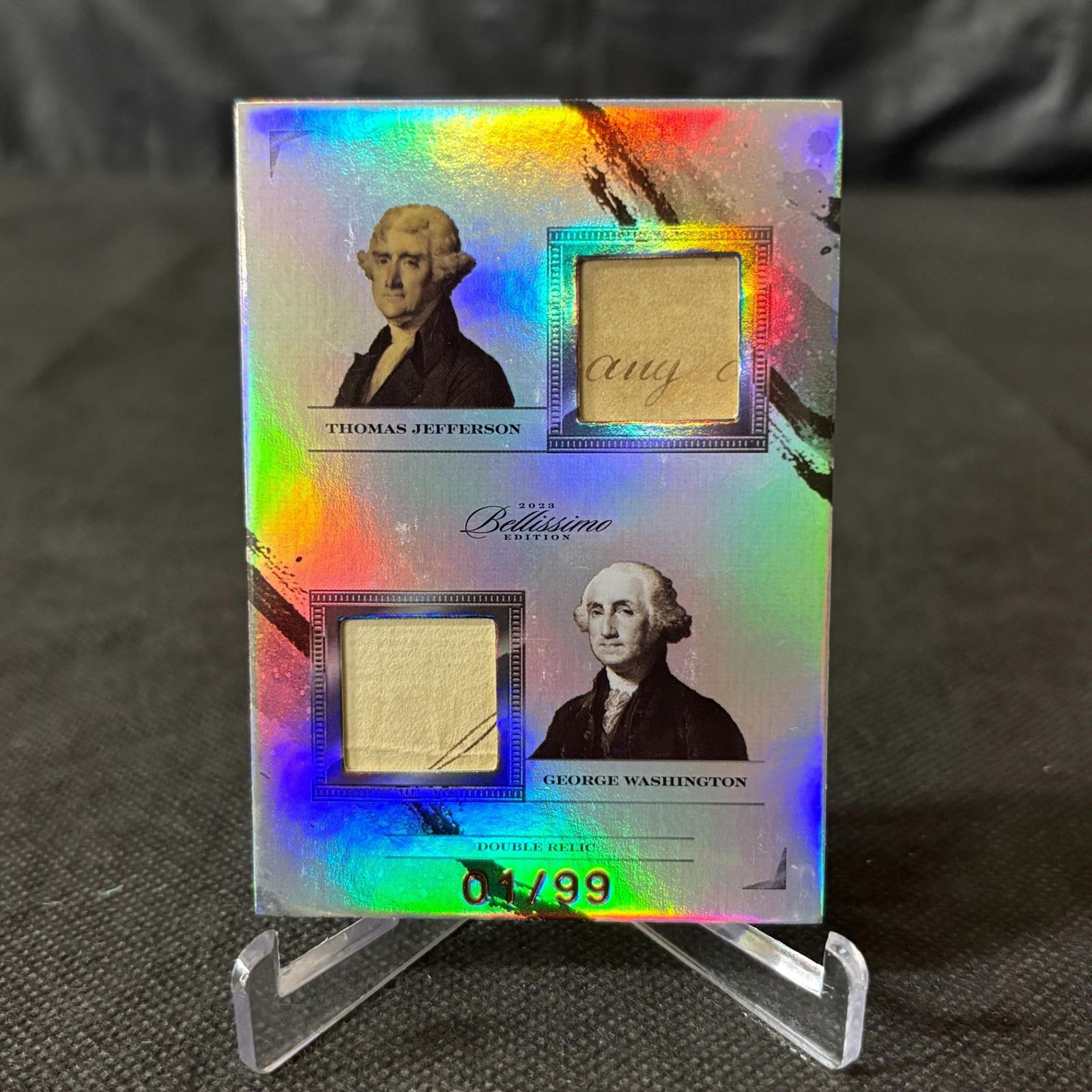 Jefferson, Washington Double Relic #/99 Writing: 2023 Bellissimo Thomas Jefferson and George Washington Double Relic Card. #/99. Features Writing. We offer in person or virtual previews of auction lots up until the day before the auction. All items