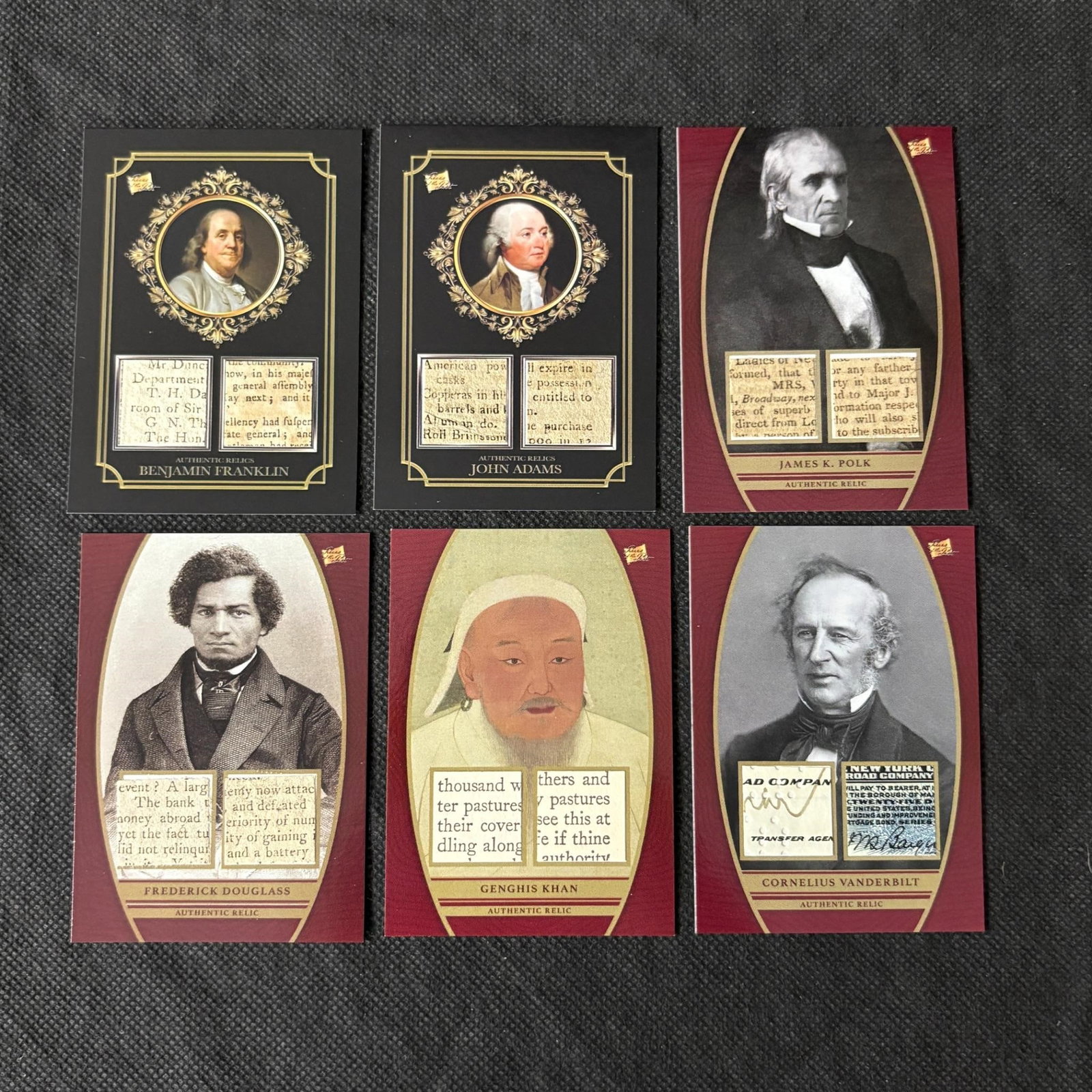 Pieces of the Past Relic Cards, Genghis Khan: Lot of Pieces of the Past Relic Cards. Includes Benjamin Franklin, John Adams, James Polk, Cornelius Vanderbilt, Genghis Khan, Frederick Douglas. We offer in person or virtual previews of auction lots