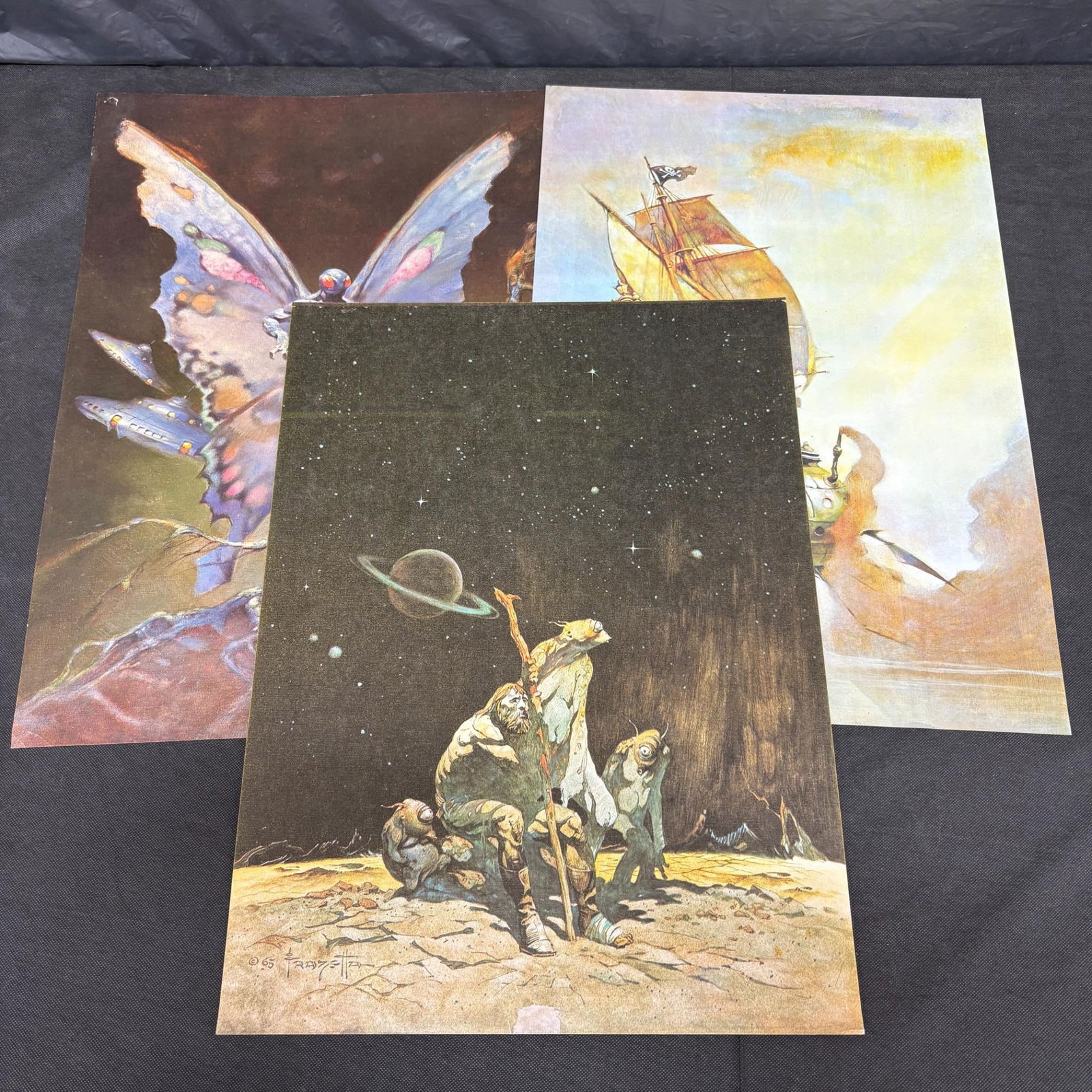 Lot of Frazetta Fantasy Art Prints: Lot of Vintage Frank Frazetta Fantasy Art Prints. Dimensions: 23x17. We offer in person or virtual previews of auction lots up until the day before the auction. All items are sold as is. Please look a