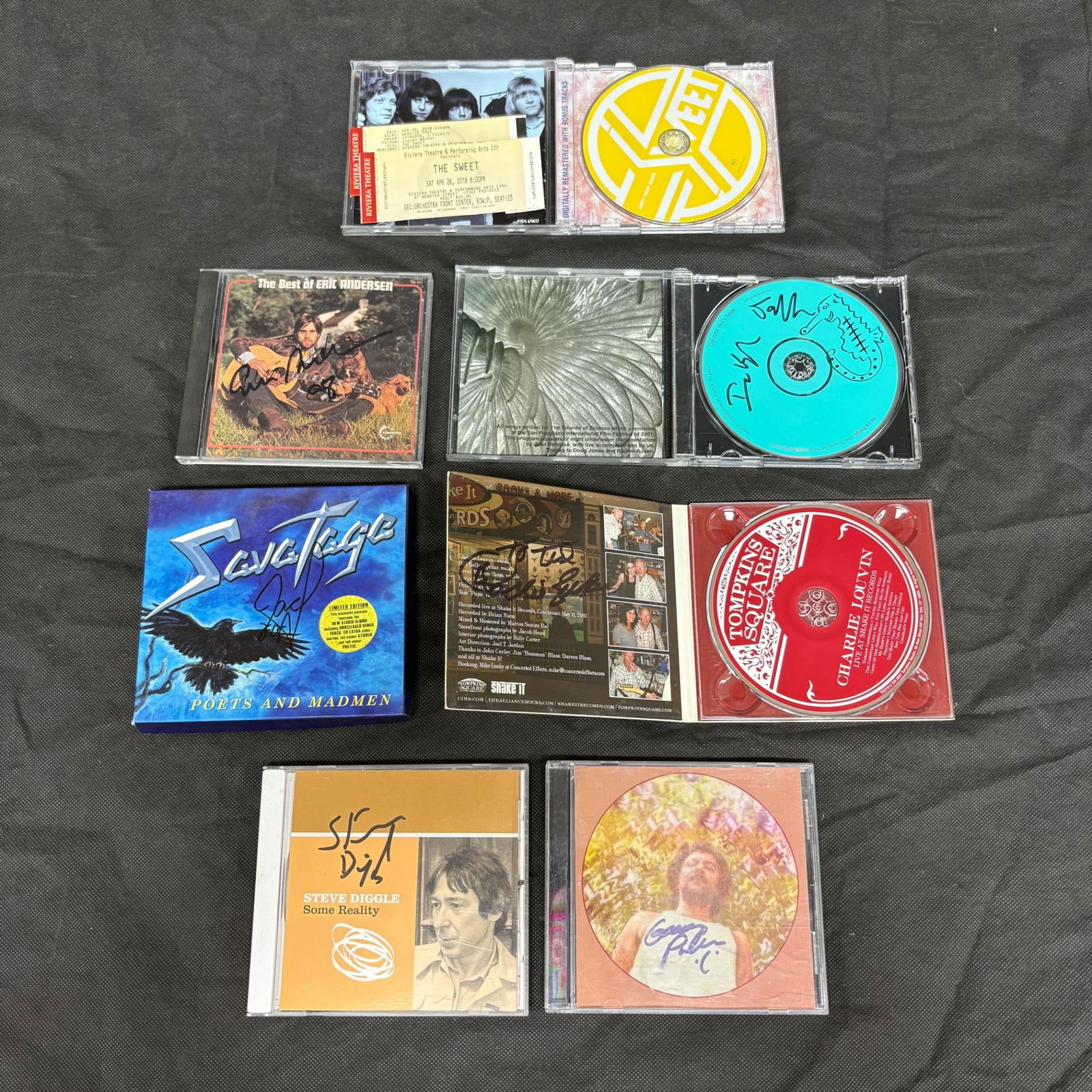 Lot of Signed CDs, George Puleo, Steve Diggle +: Includes Signatures from Steve Diggle and George Puleo as well as signed CDS and Poster from Savatage, Eric Anderson, Tompkins Square, + We offer in person or virtual previews of auction lots up until