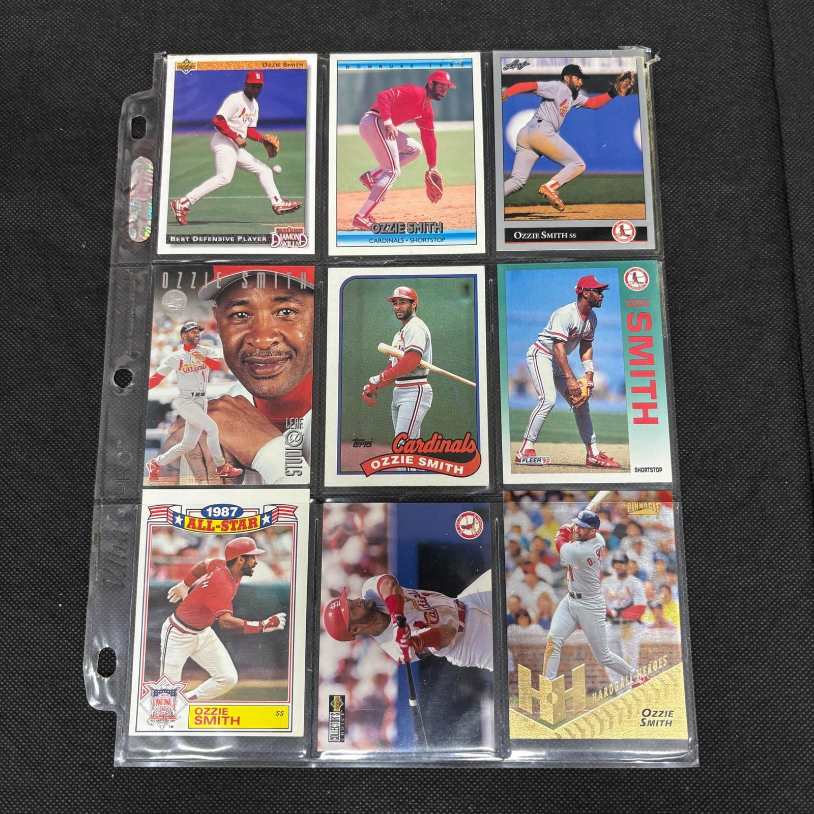 SHEET OF 9 HOF OZZIE SMITH CARDS (1 of 2)